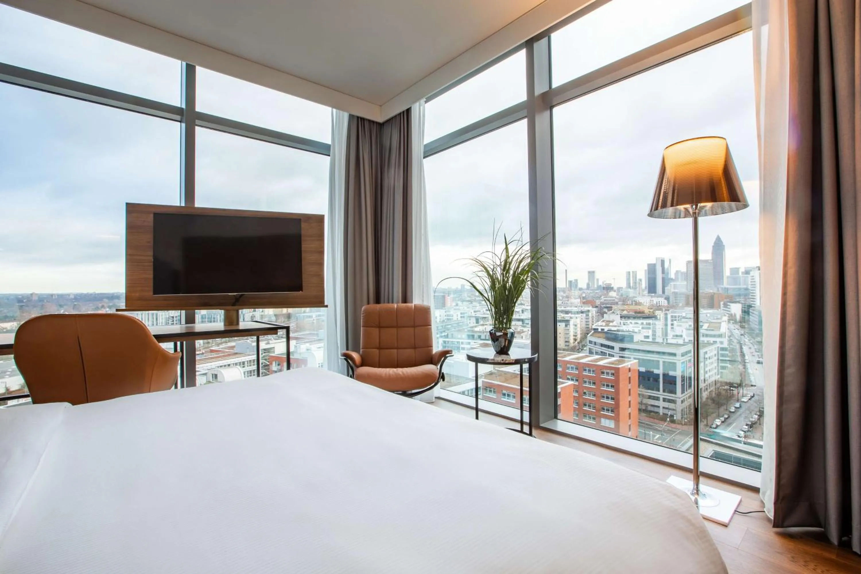 View (from property/room), Bed in Radisson Blu Hotel Frankfurt