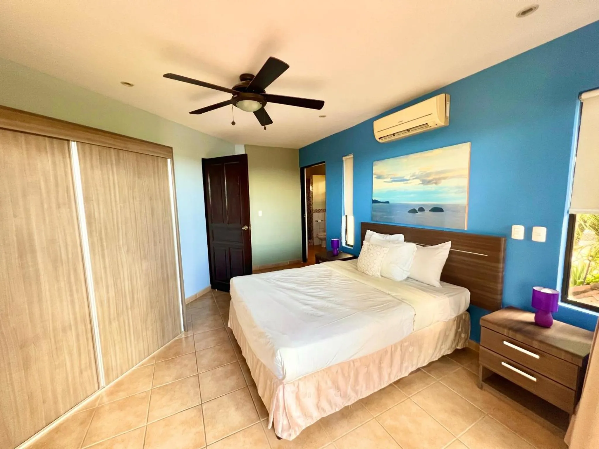 Bedroom, Bed in Tropical Gardens Suites and Apartments