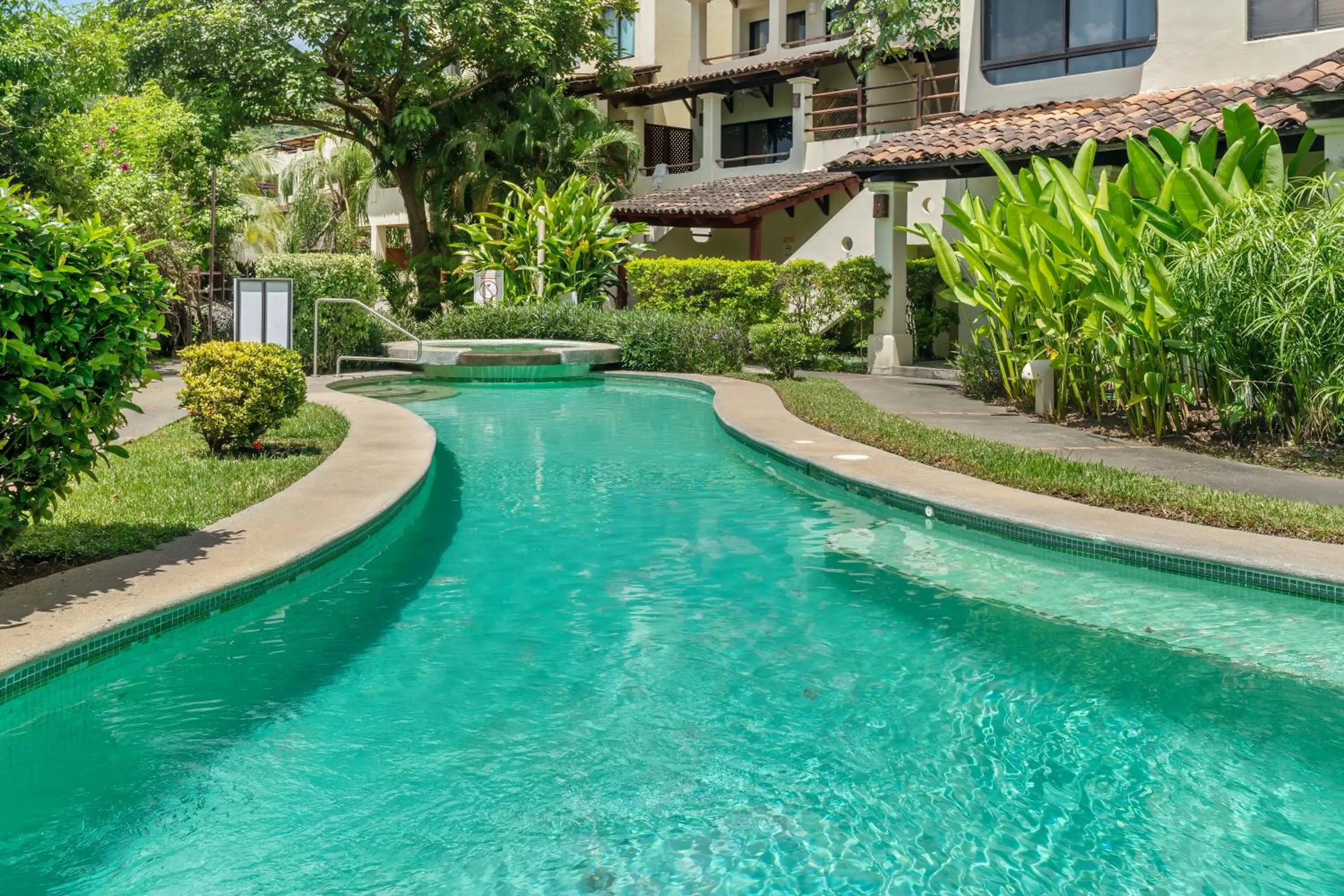 Swimming pool in Tropical Gardens Suites and Apartments