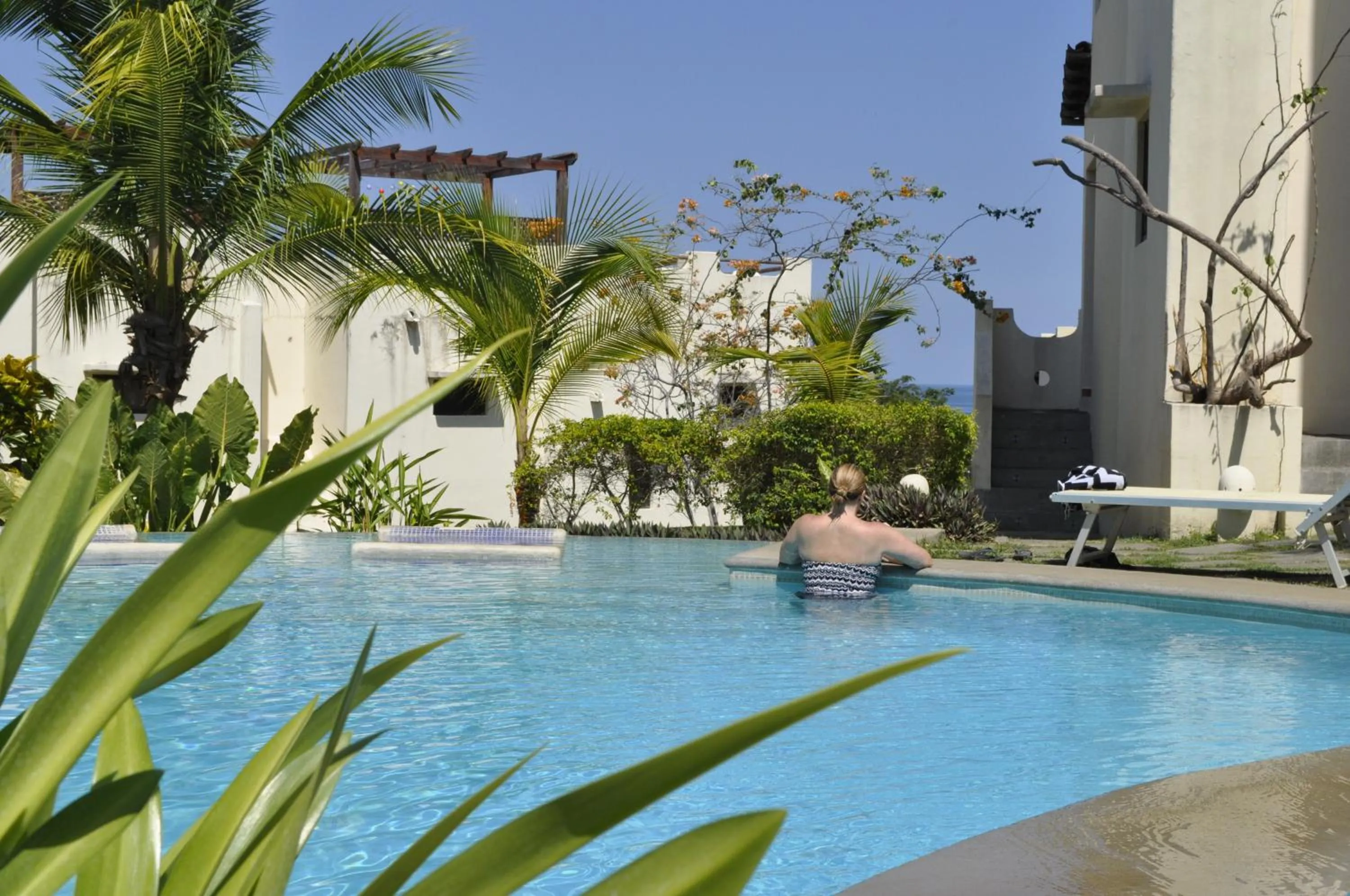 Swimming pool in Tropical Gardens Suites and Apartments