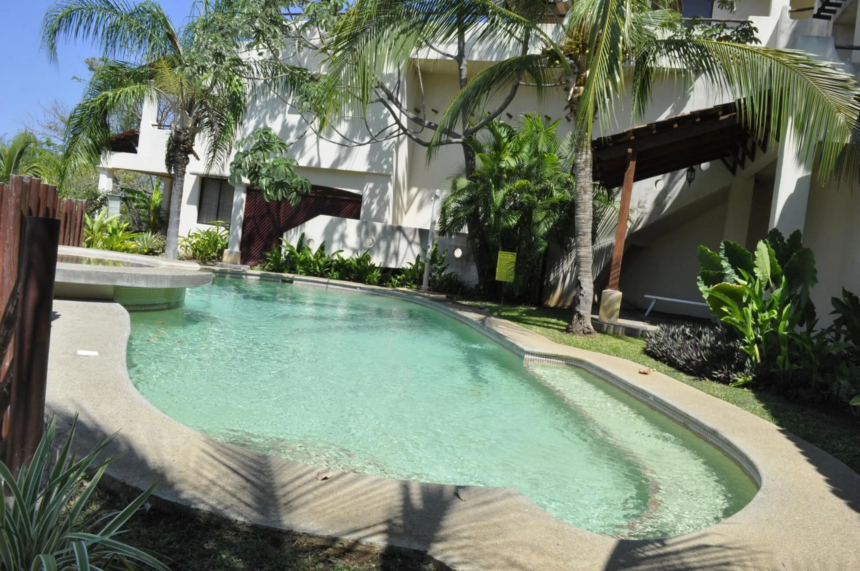 Swimming pool in Tropical Gardens Suites and Apartments