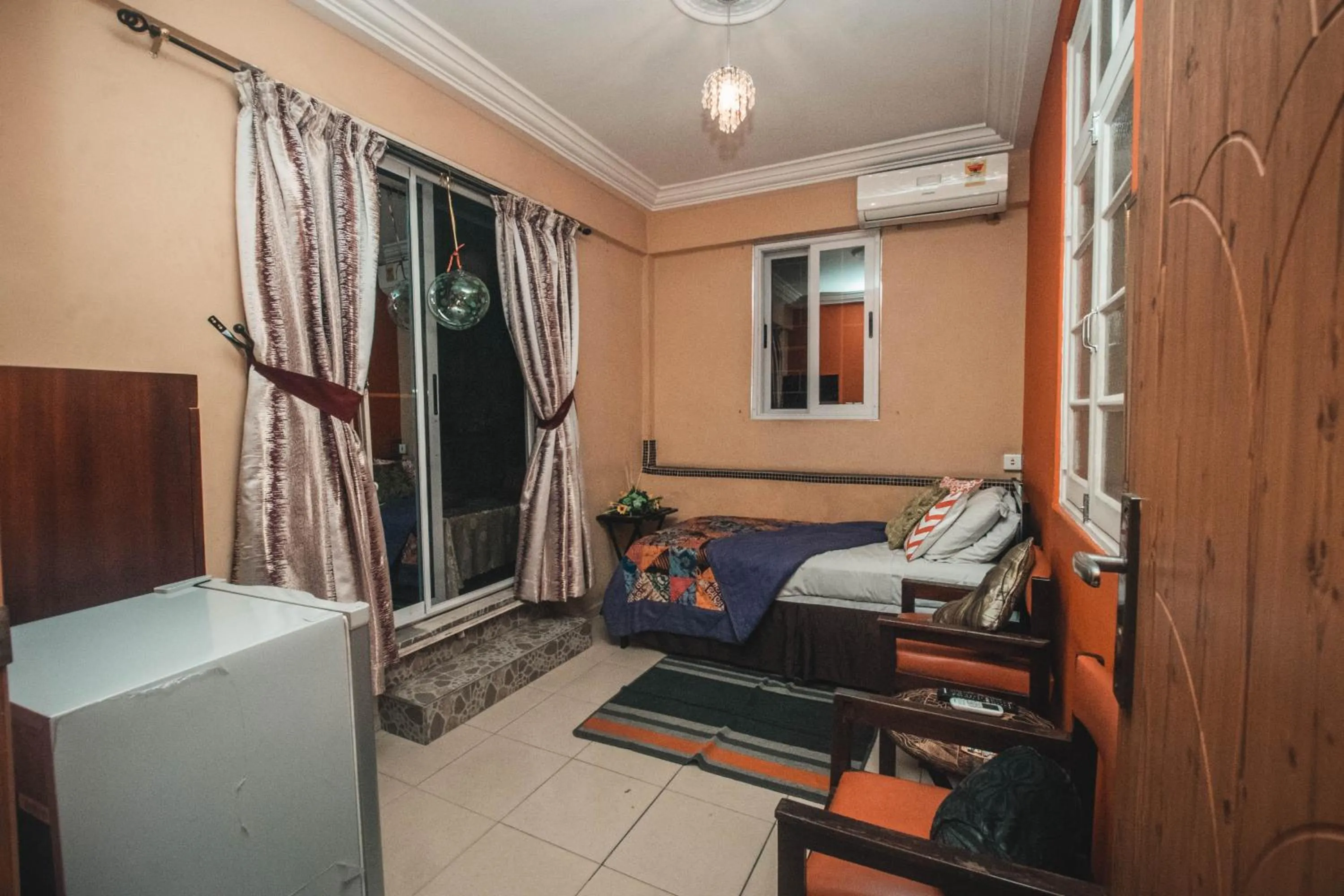 Seating area, Bed in Jesiwa B's Little Palace