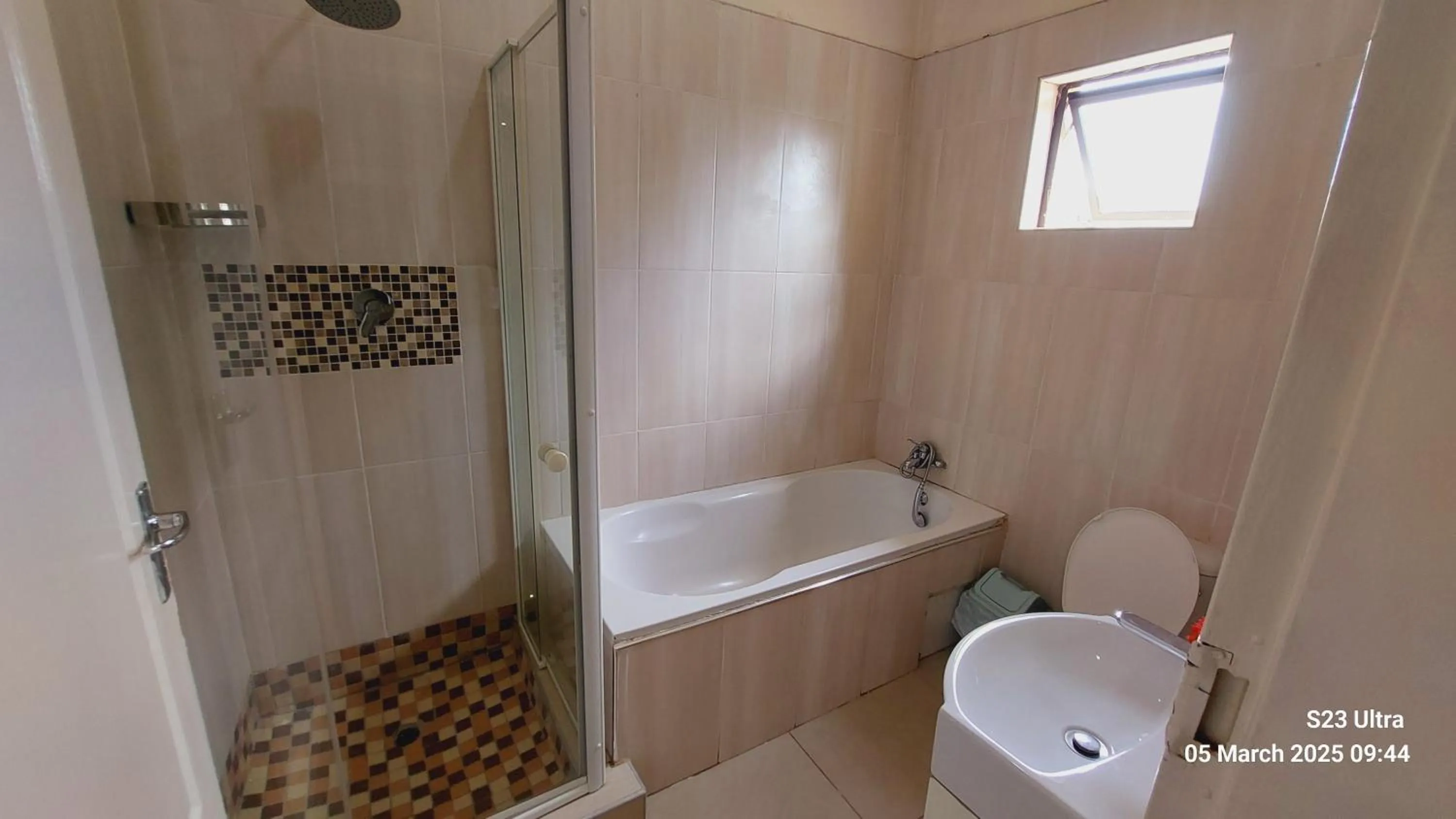 Toilet in Comfort Palace Guest House Kasane
