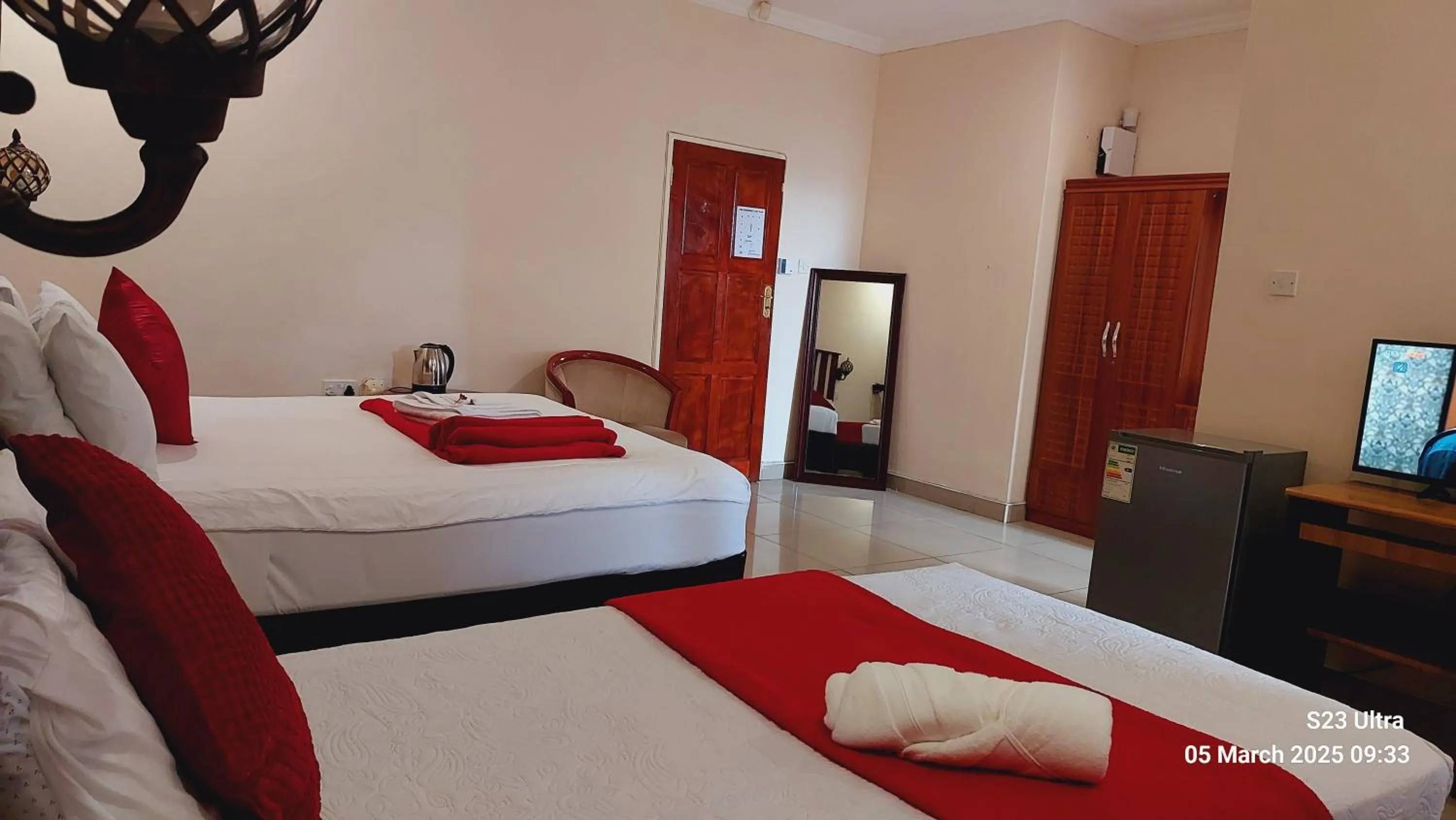 Bed in Comfort Palace Guest House Kasane