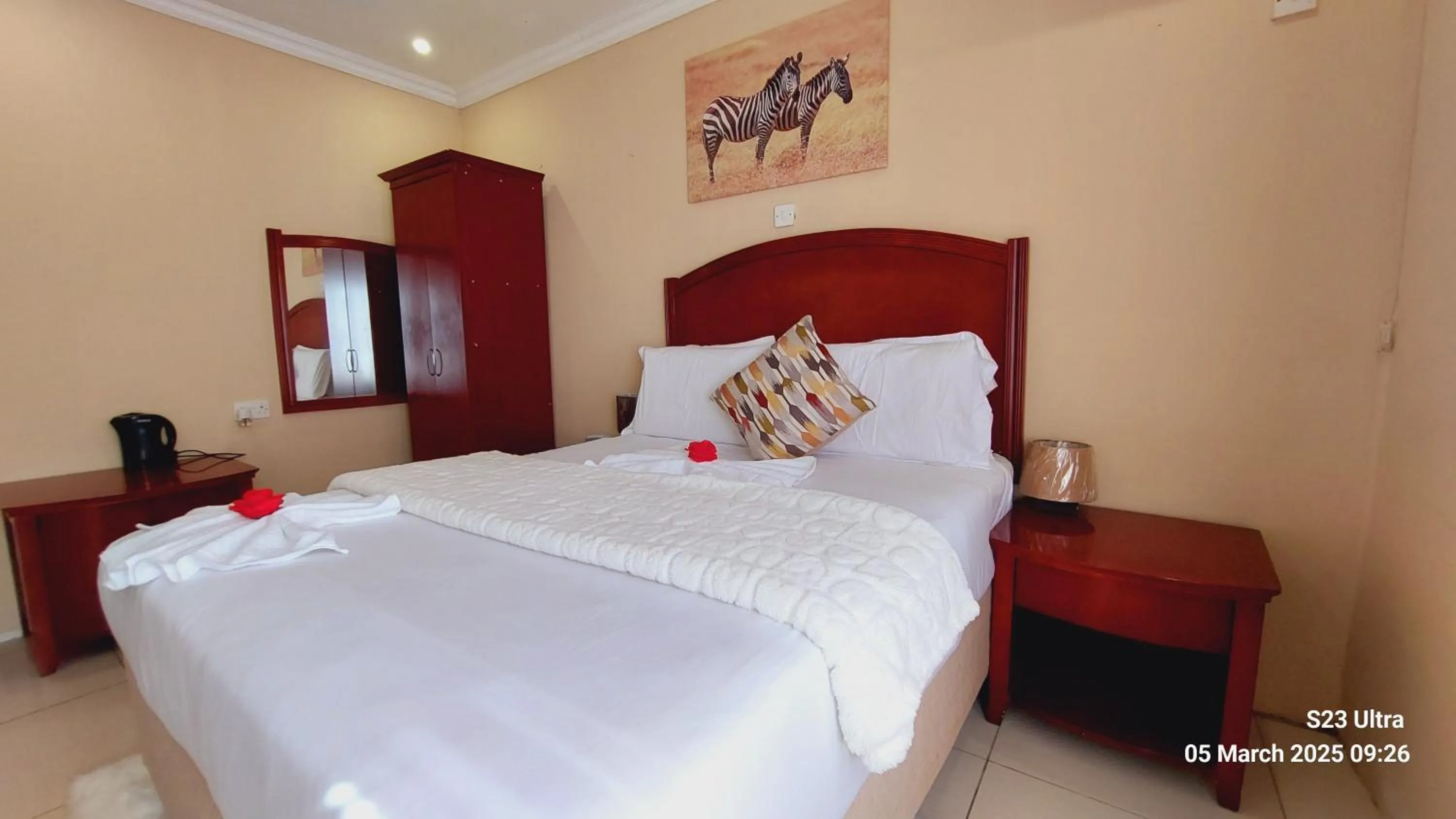 Bed in Comfort Palace Guest House Kasane