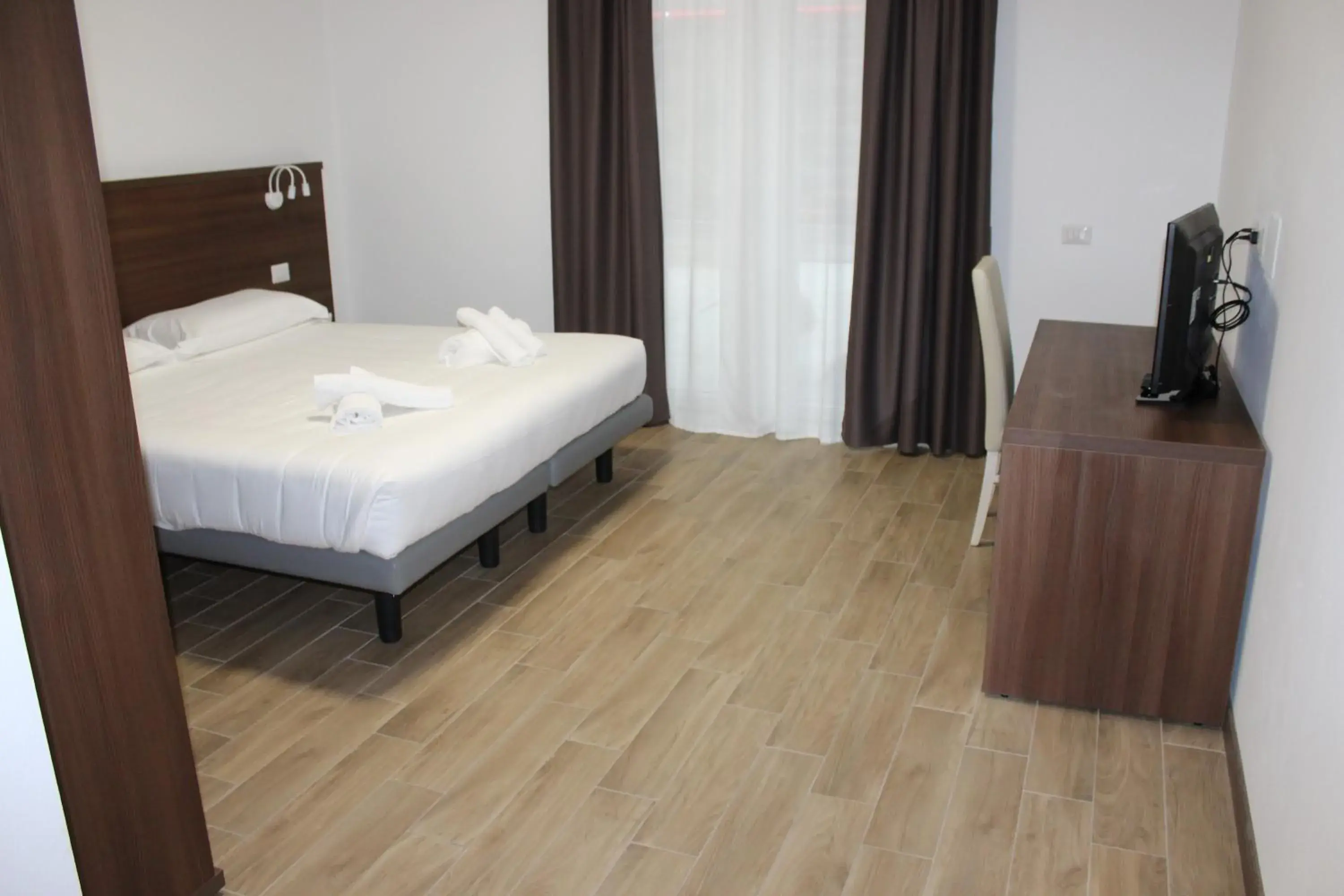 Two-Connecting Double Rooms with Garden View in Hotel Bocciolo Two-Connecting Double Rooms with Garden View in Hotel Bocciolo