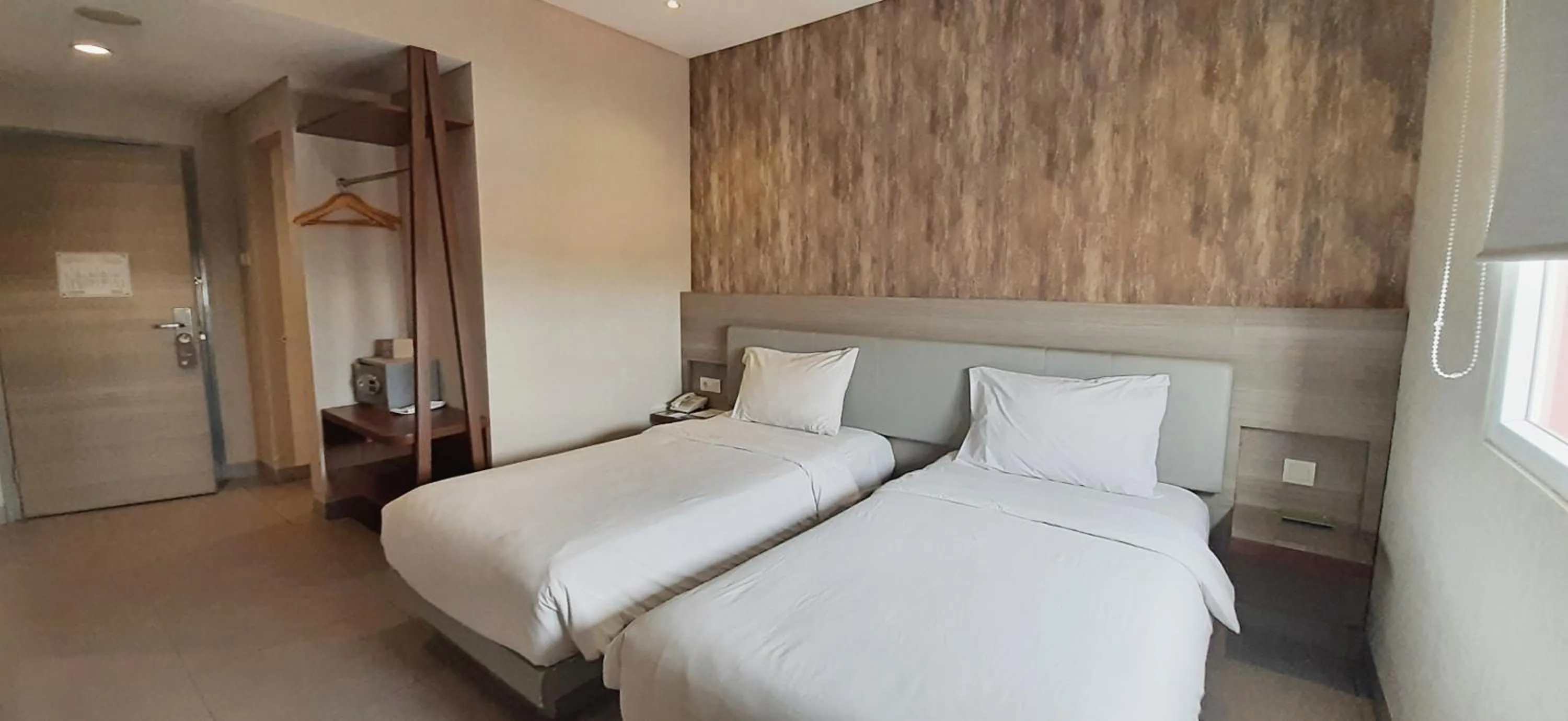 Bed in Amaris Hotel Serang