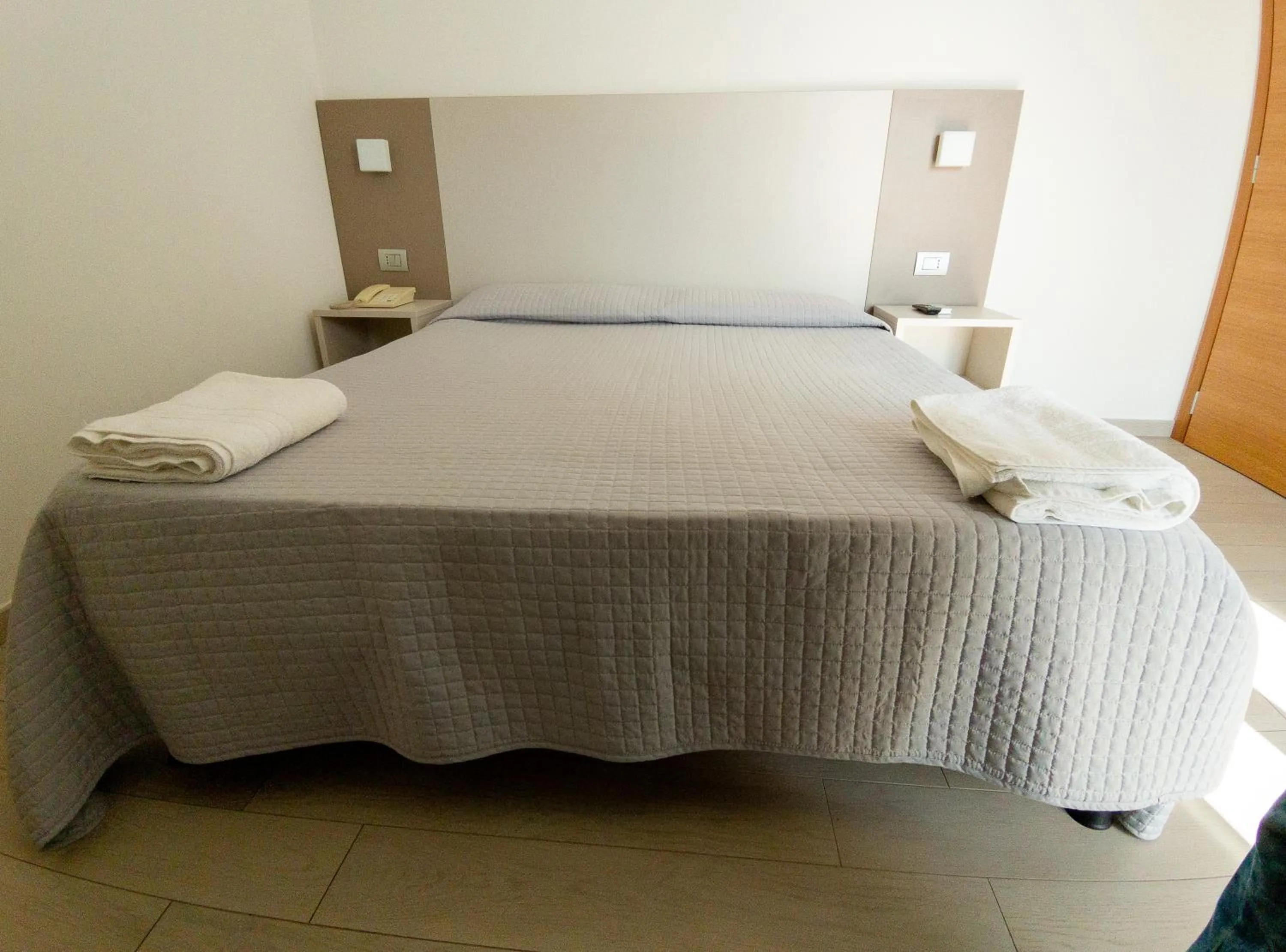 Bed in Hotel Capitano