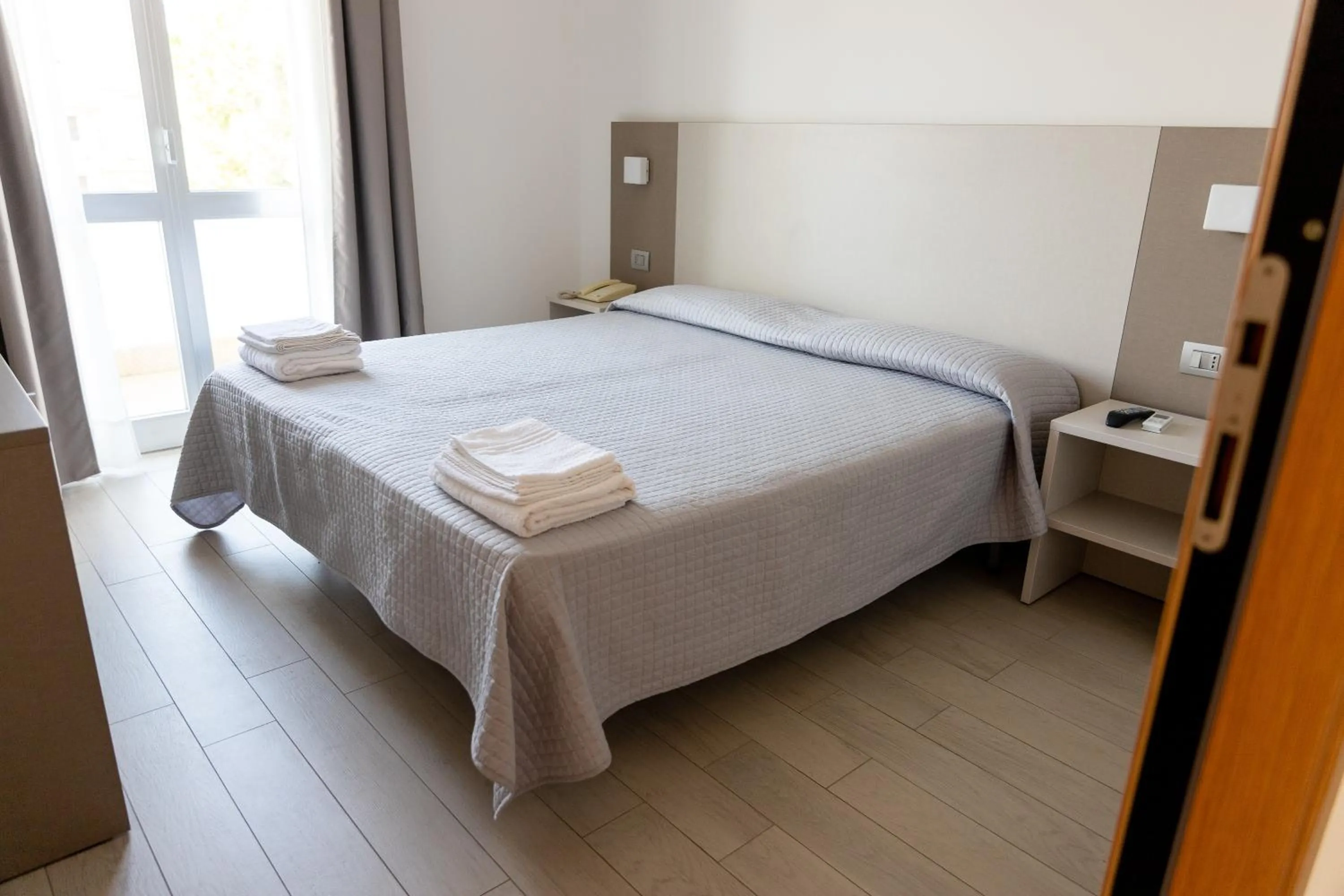 Bed in Hotel Capitano