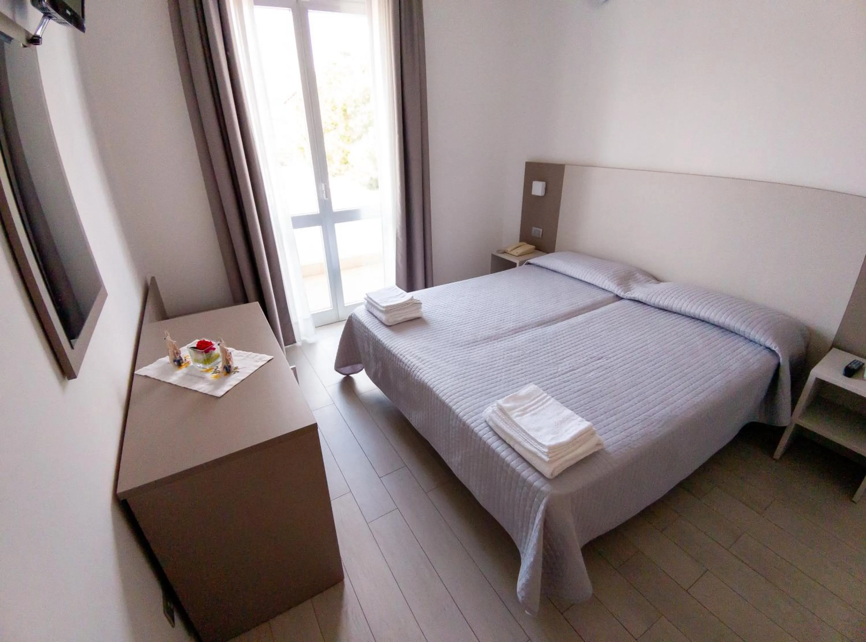 Bedroom, Bed in Hotel Capitano