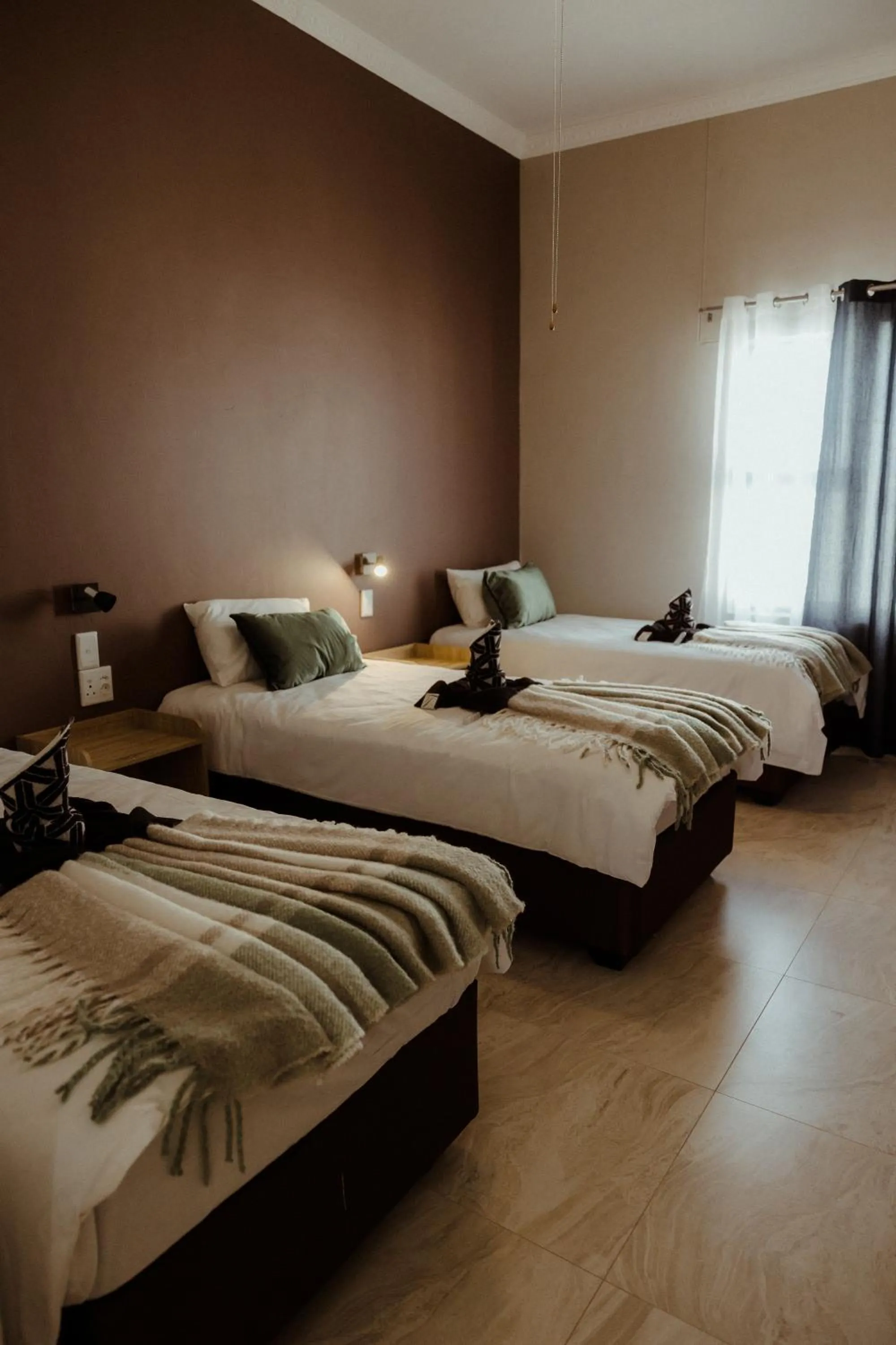 Bed in Out of Africa Town Lodge