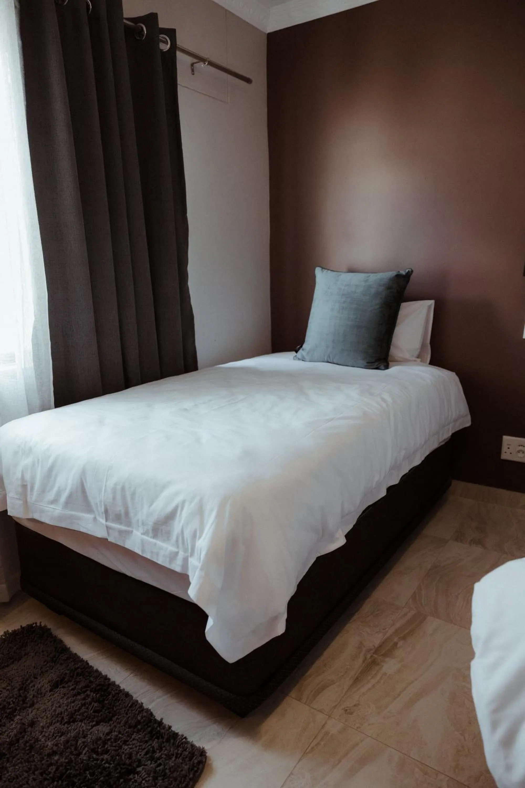 Bed in Out of Africa Town Lodge