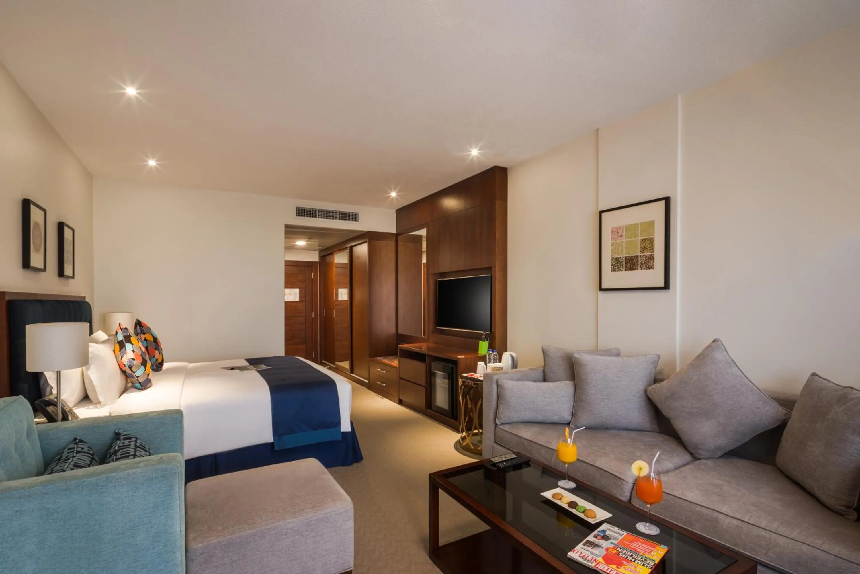 Seating area, Bed in Alreem Village Hotel