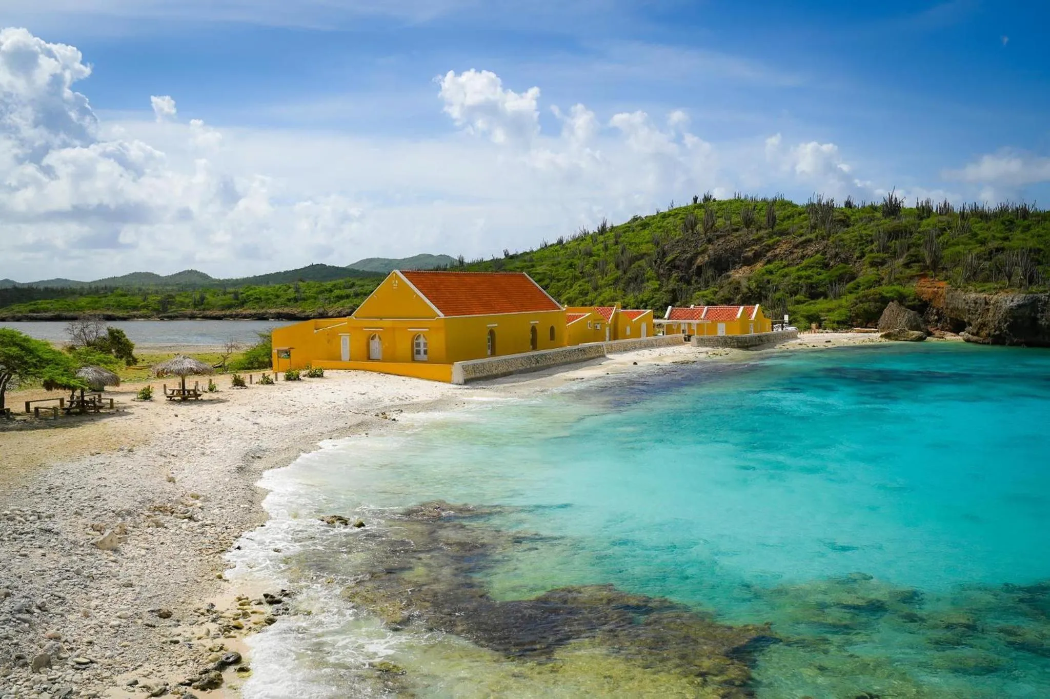 Beach in Delfins Beach Resort Bonaire, Tapestry Collection by Hilton