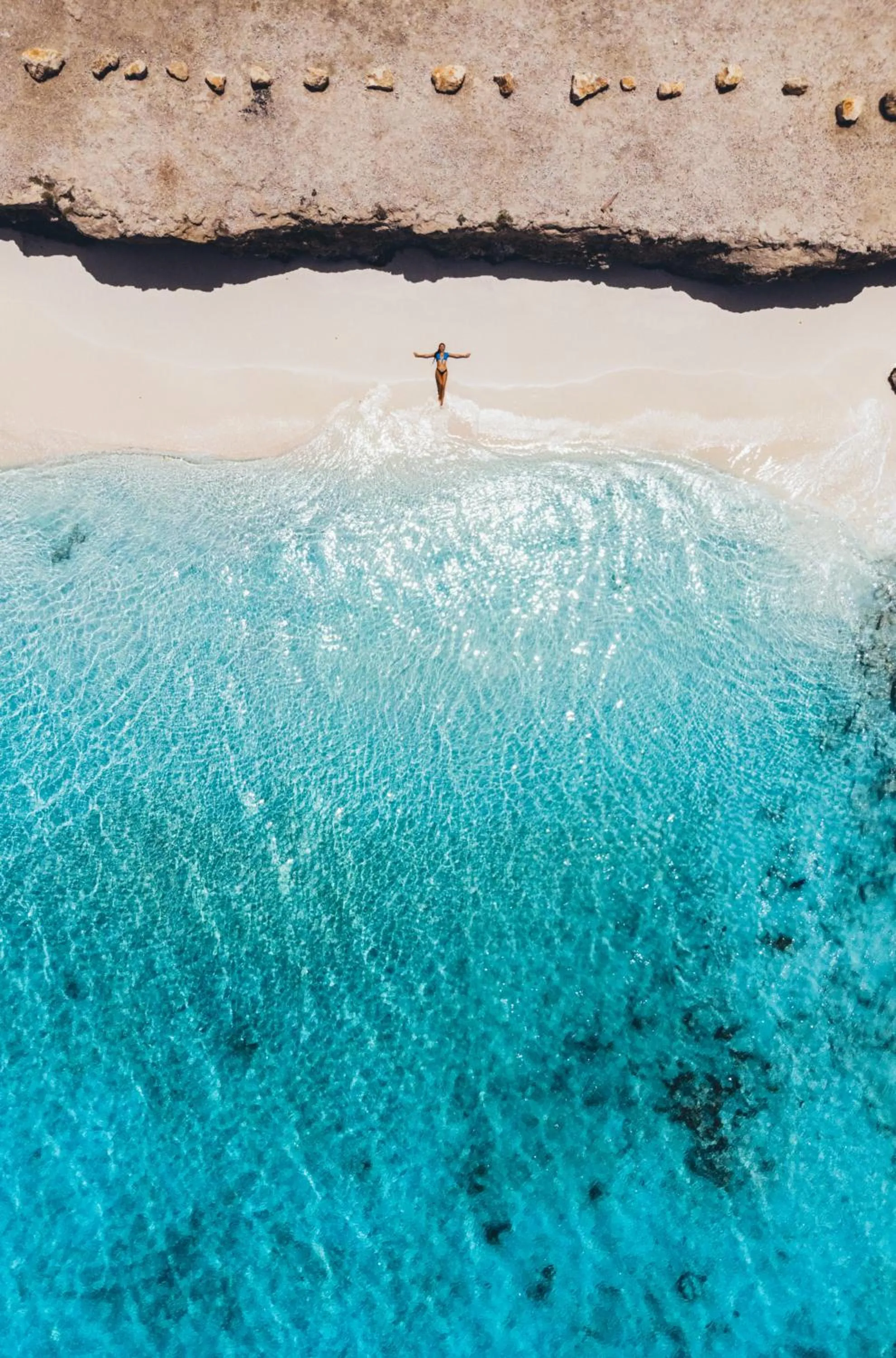 Beach in Delfins Beach Resort Bonaire, Tapestry Collection by Hilton