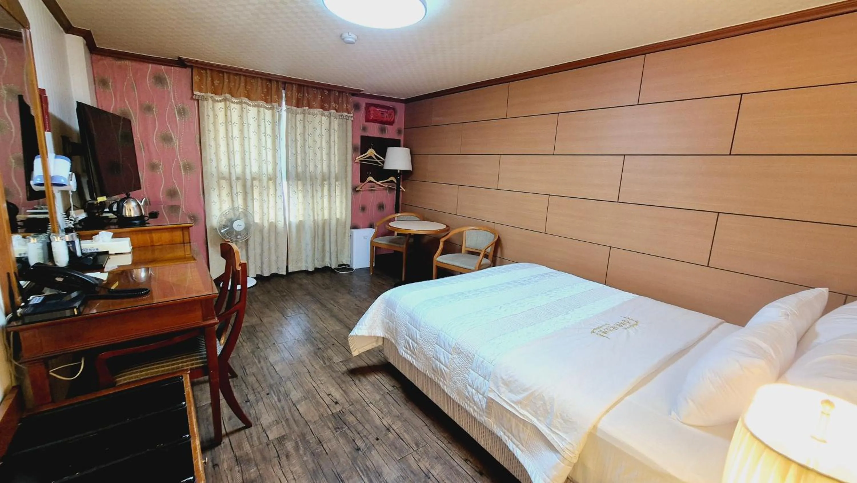 Bed in Kyungha Spa Hotel