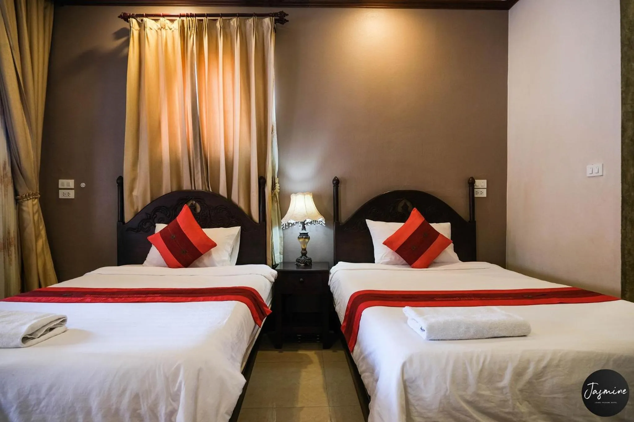 Bed in Jasmine Luangprabang Hotel