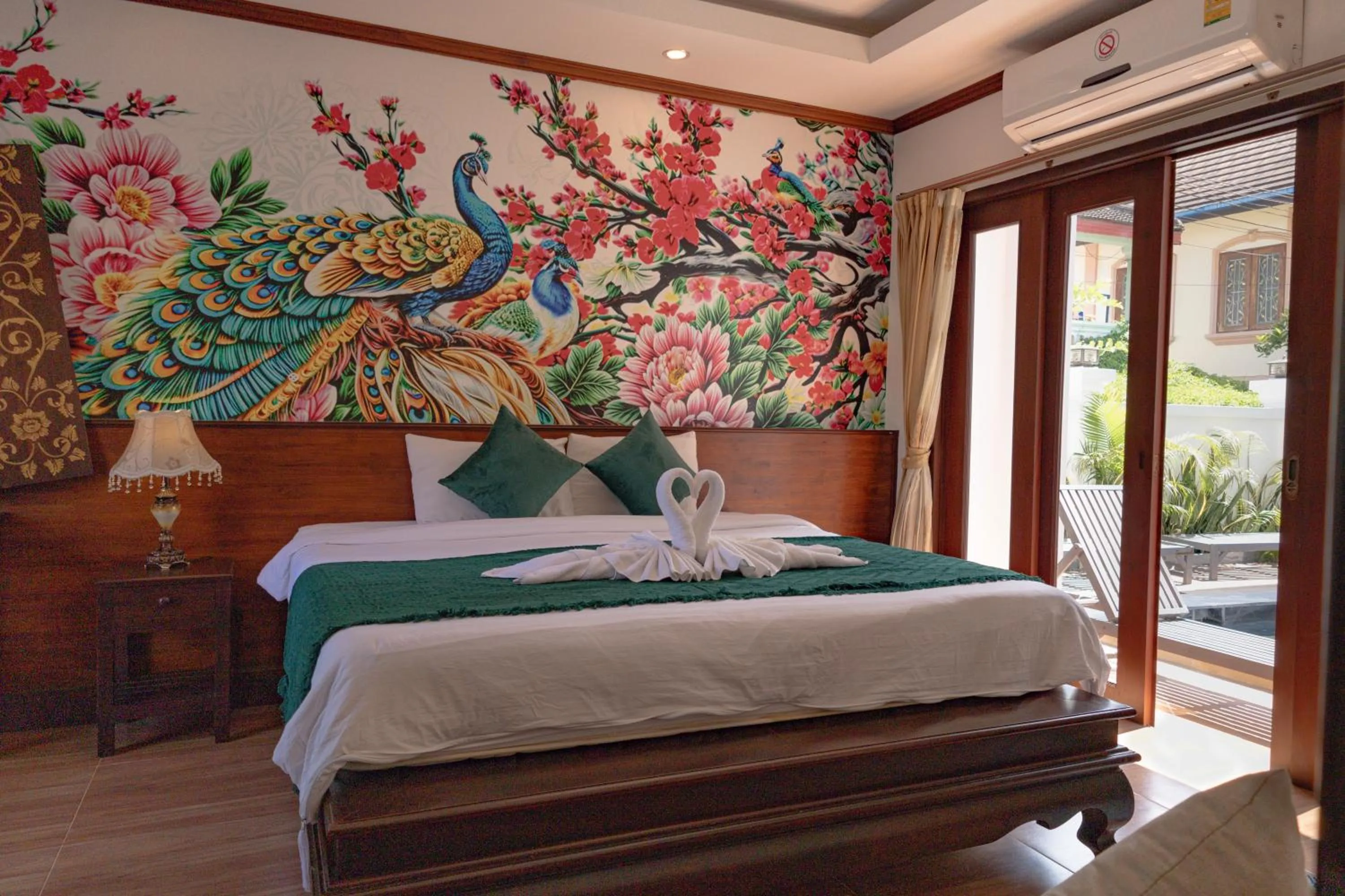 Photo of the whole room, Bed in Jasmine Luangprabang Hotel