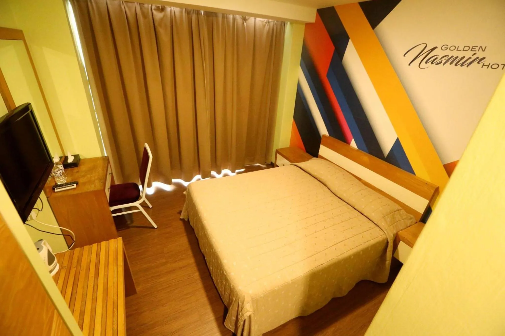 Bed in Golden Nasmir Hotel