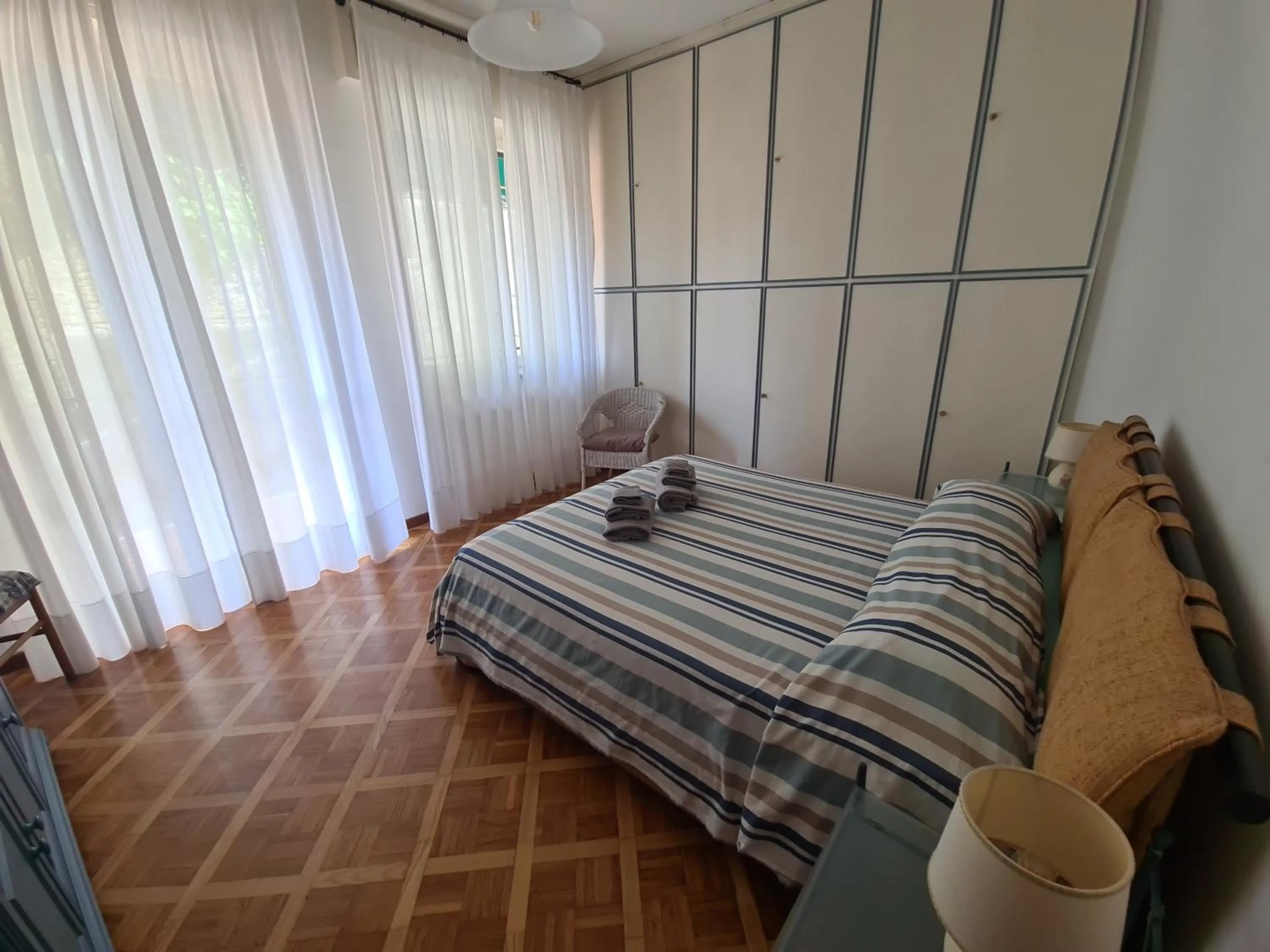 Bed in Turchino Apartment & Terrazza della Luisa by PortofinoVacanze