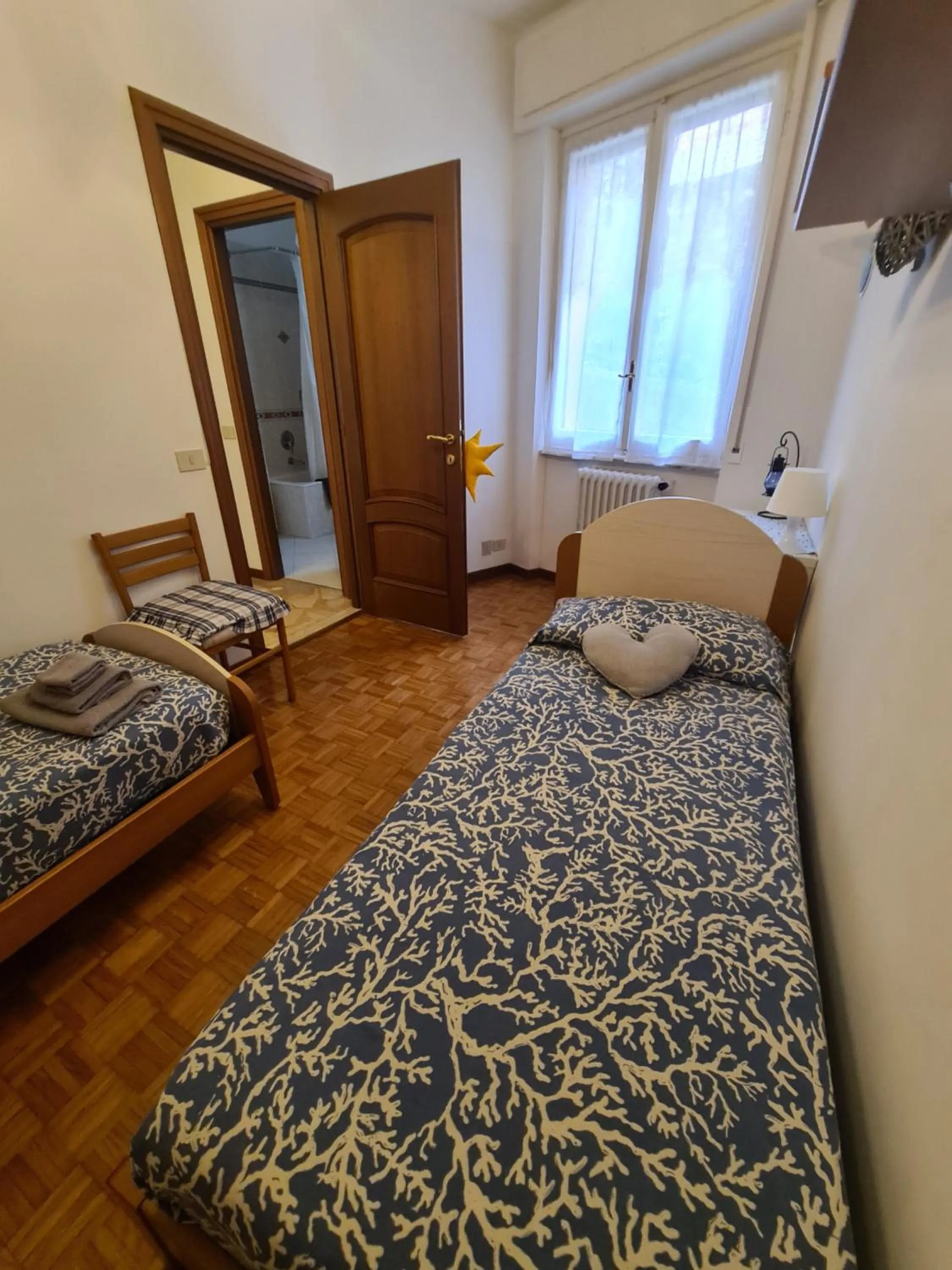 Bed in Turchino Apartment & Terrazza della Luisa by PortofinoVacanze