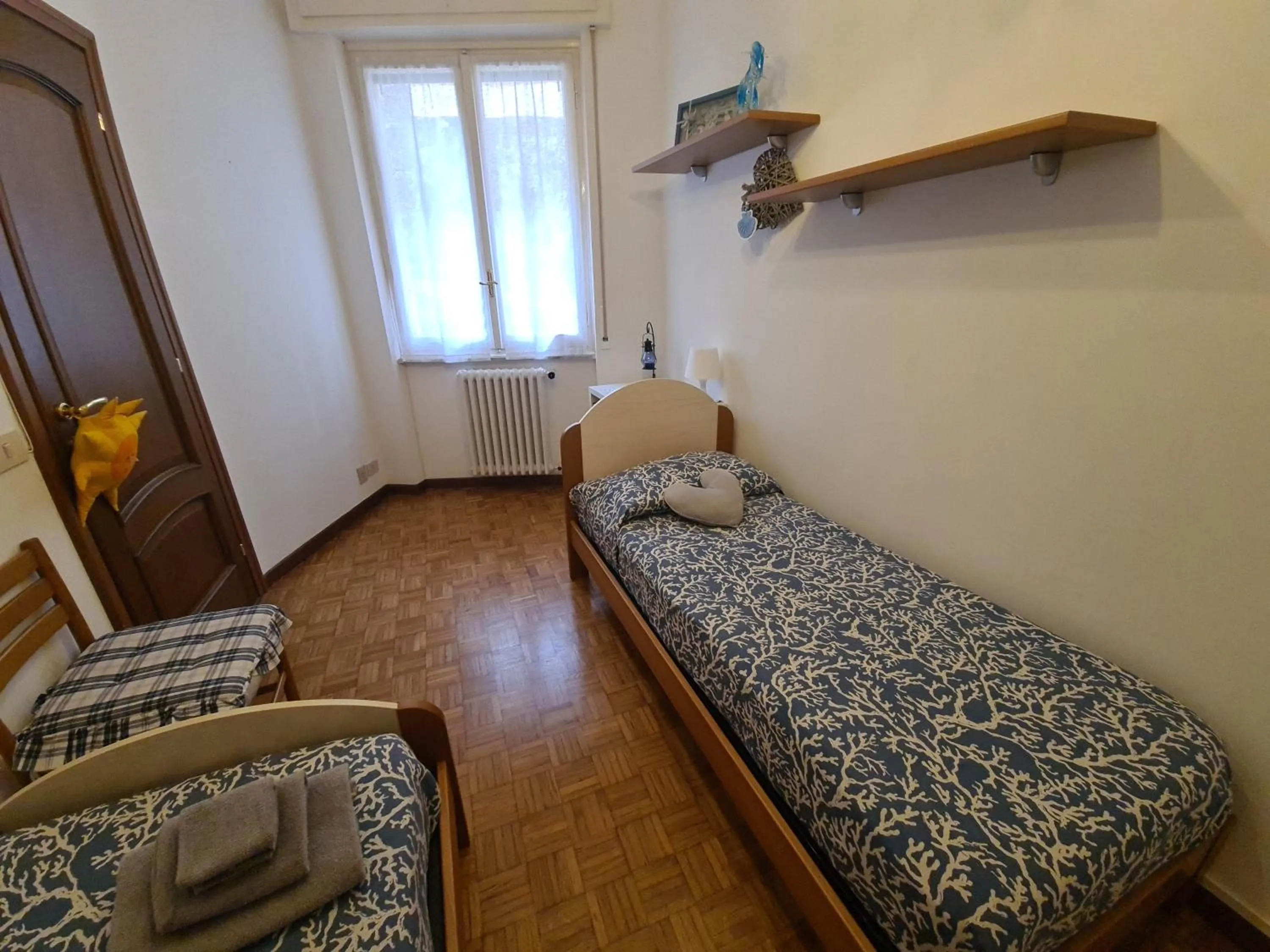 Bed in Turchino Apartment & Terrazza della Luisa by PortofinoVacanze