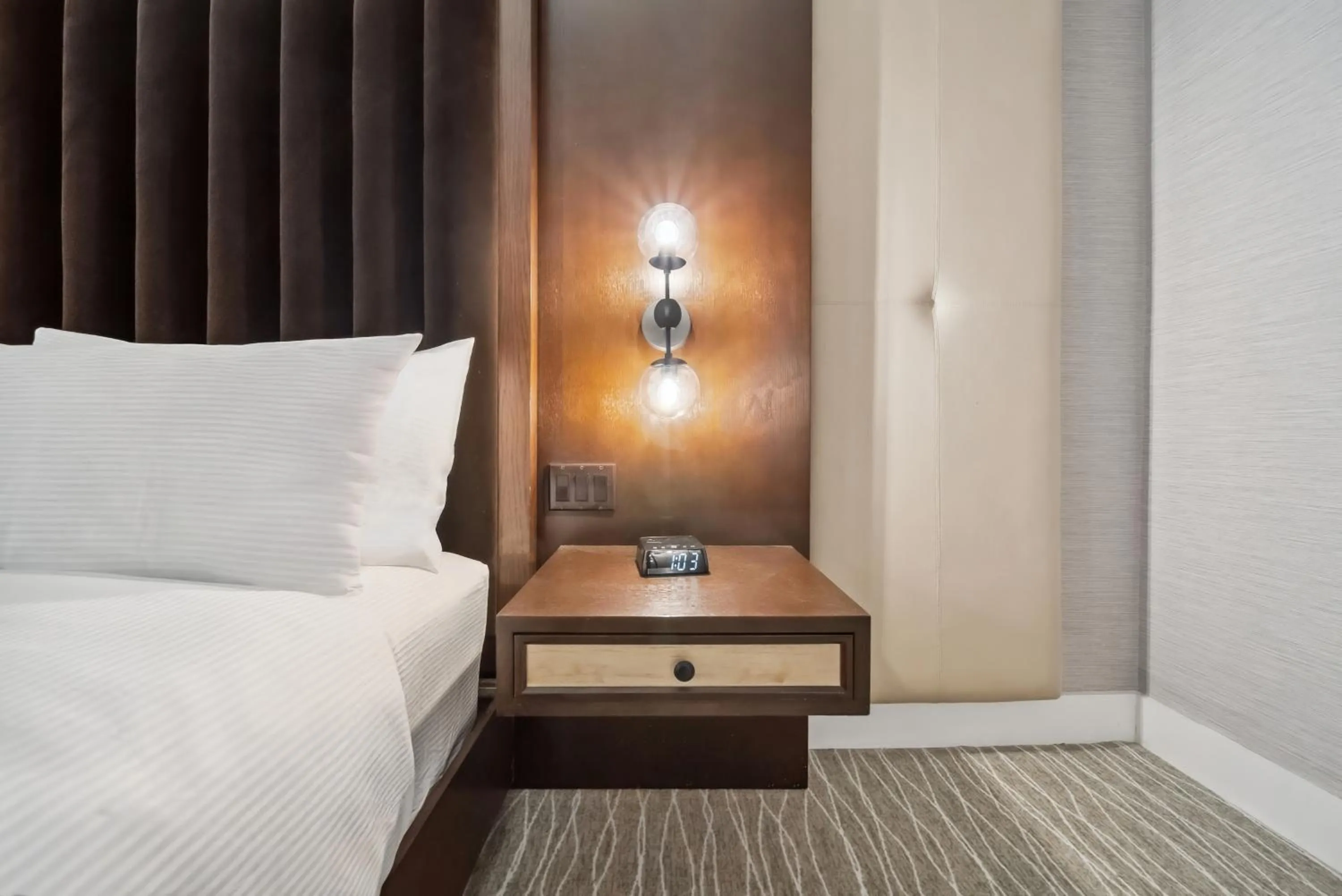 Bed in Lexington Plaza Hotel