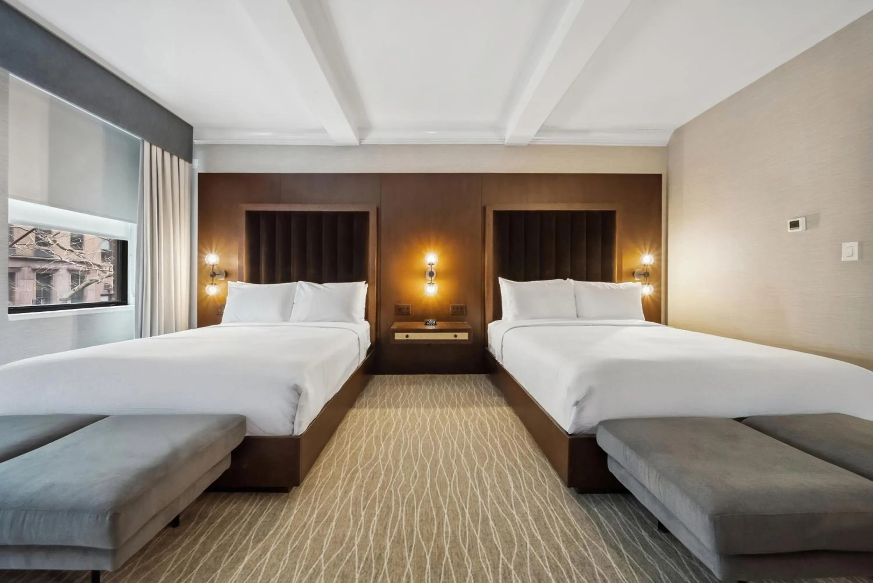 Bed in Lexington Plaza Hotel