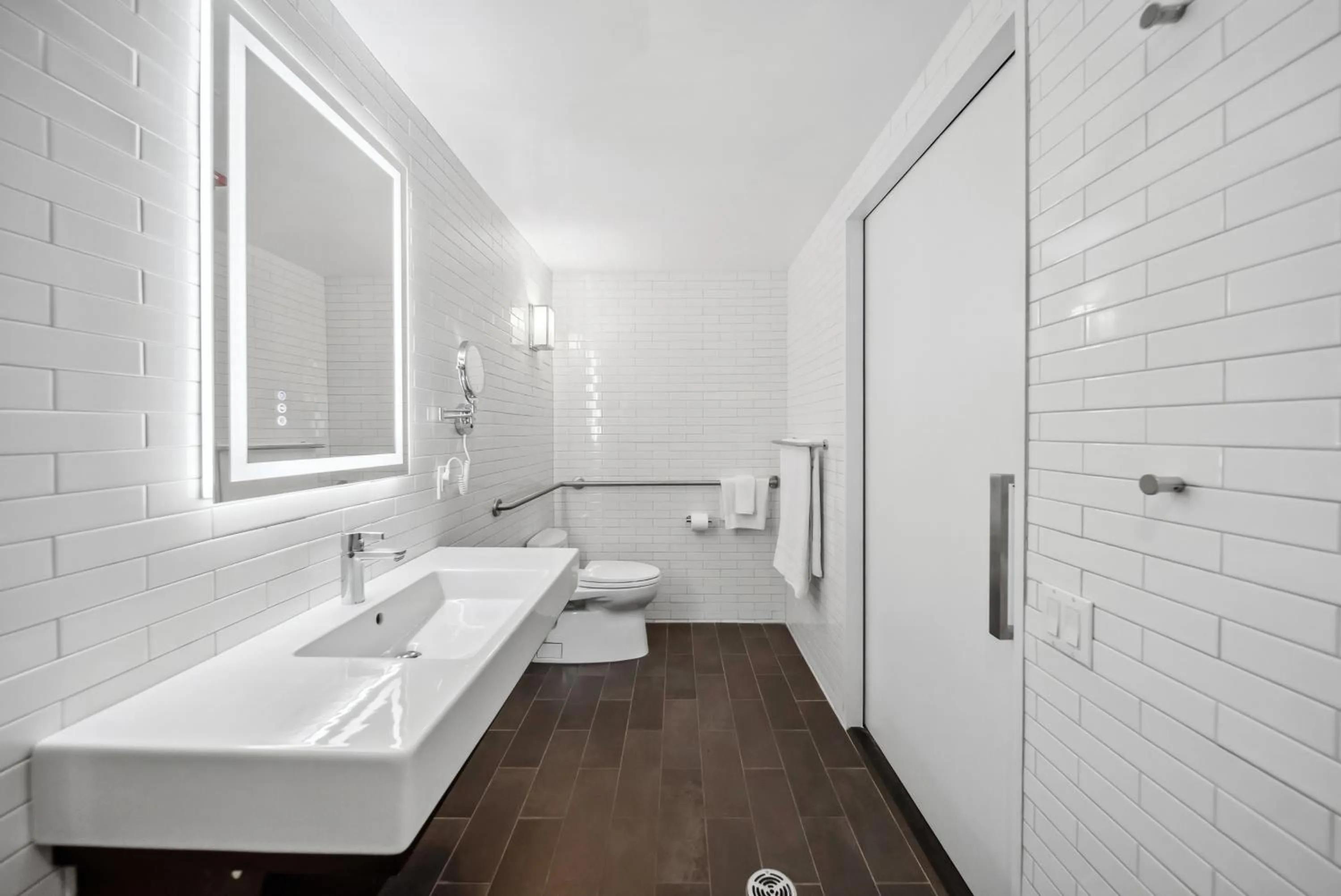 Toilet in Lexington Plaza Hotel