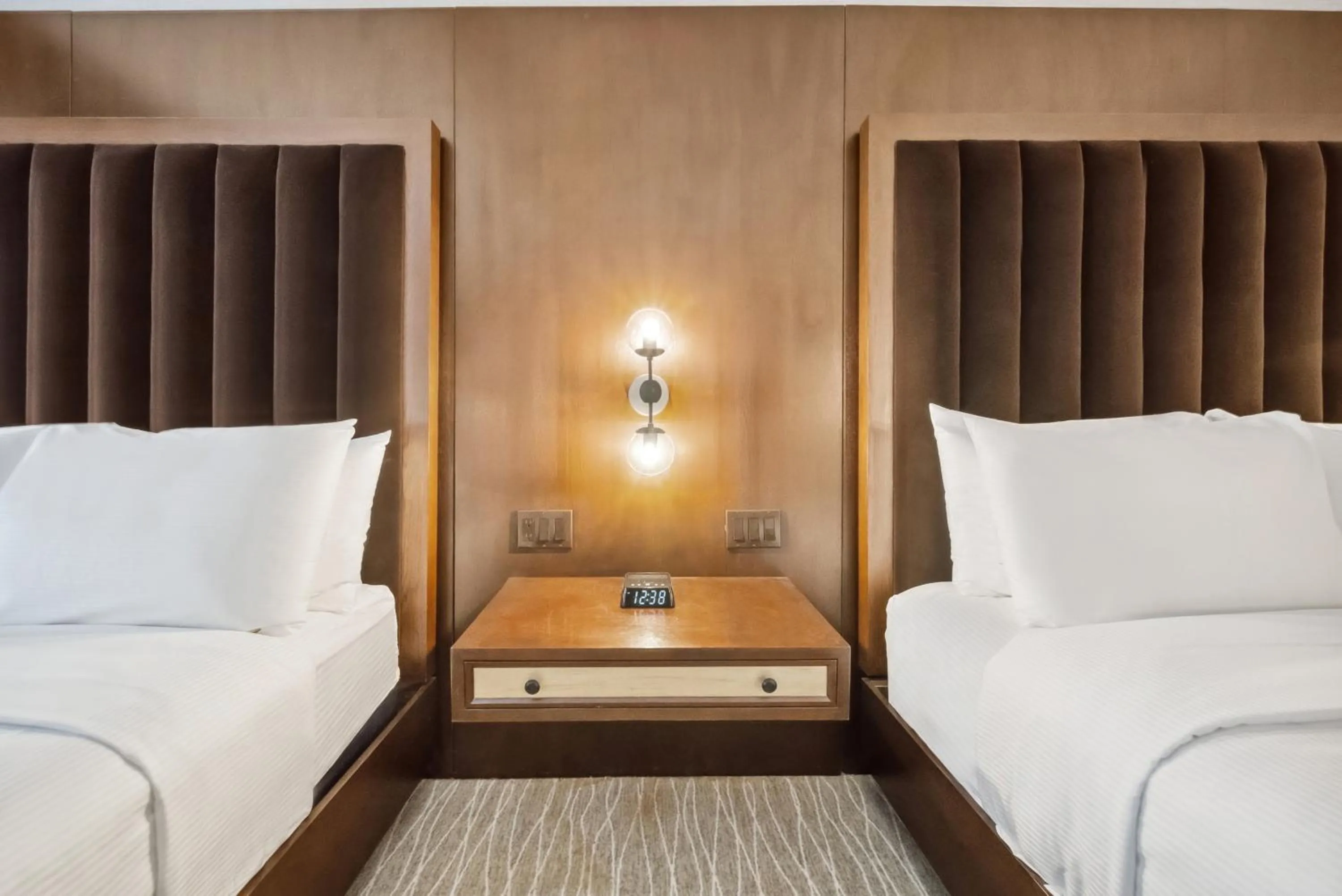 Bed in Lexington Plaza Hotel