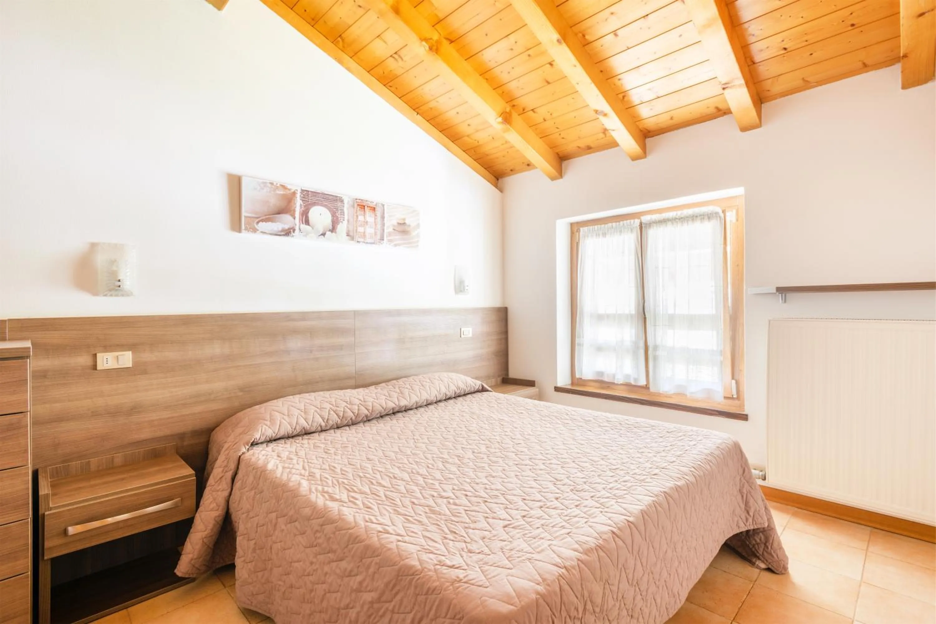 Photo of the whole room, Bed in CROSINA HOLIDAY - Casa Lucia