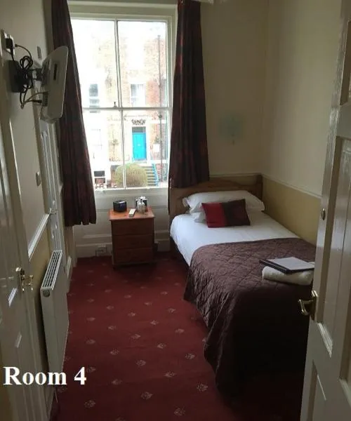 Bed in The Arches Guest House