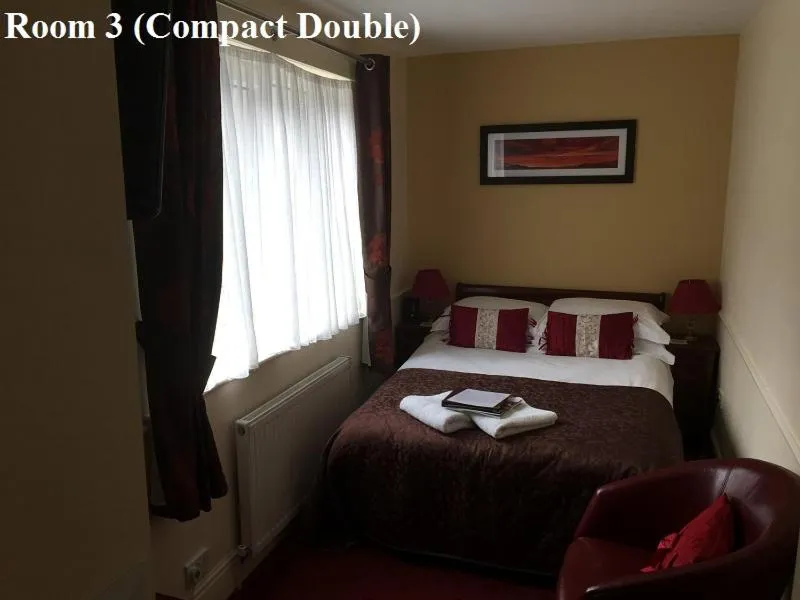 Bed in The Arches Guest House