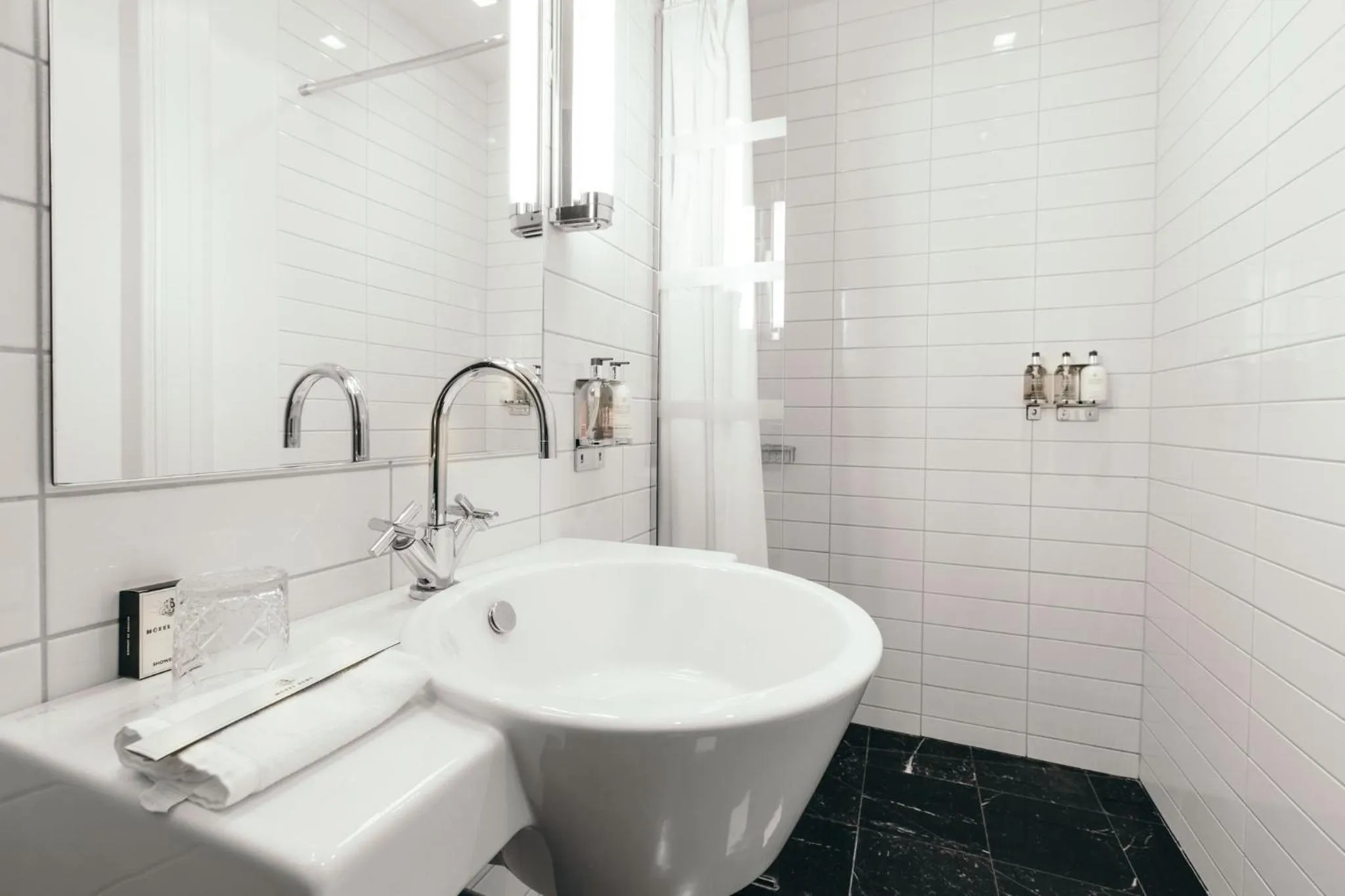 Bathroom in Hotel Borg by Keahotels