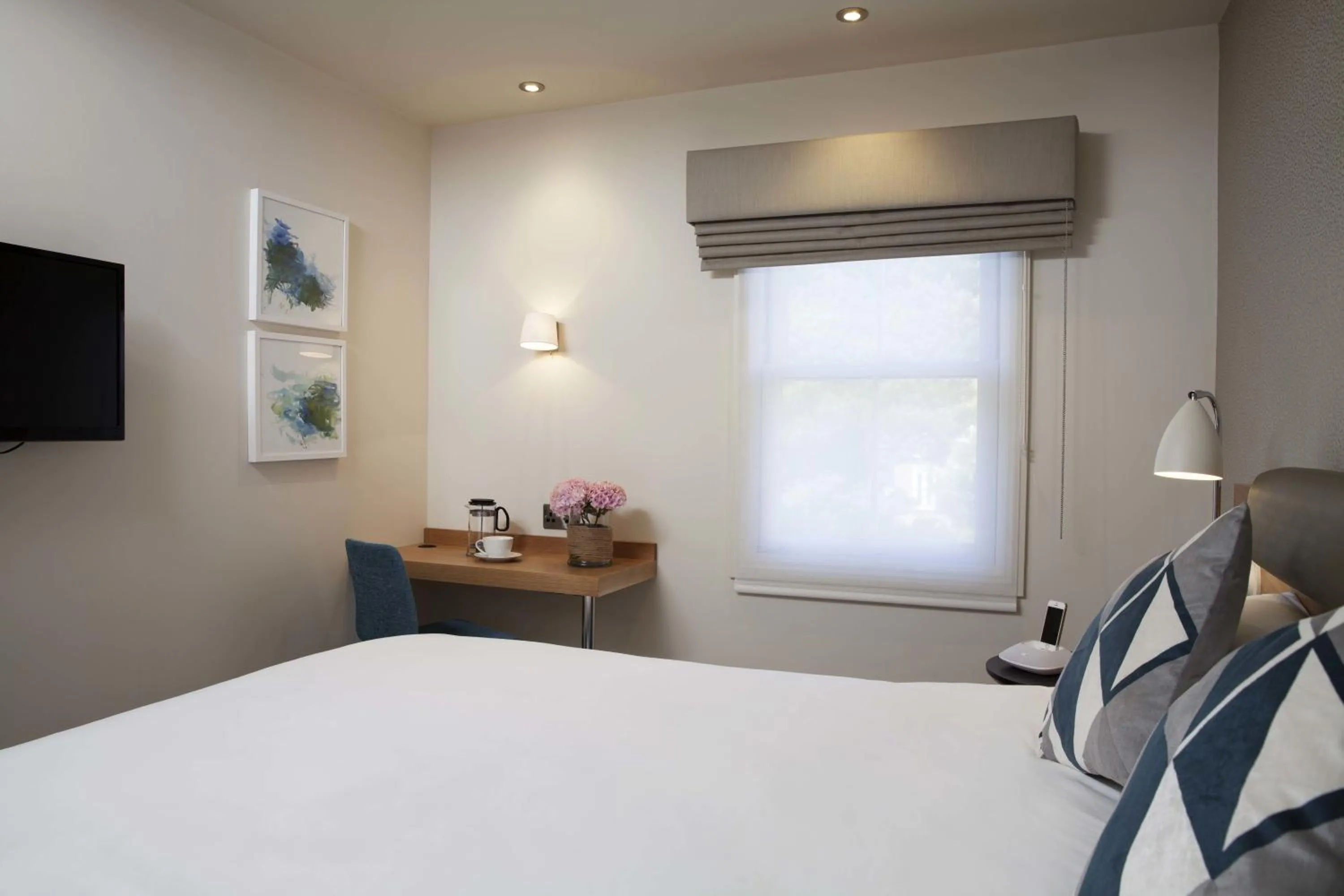 Bed in The Orchid Hotel