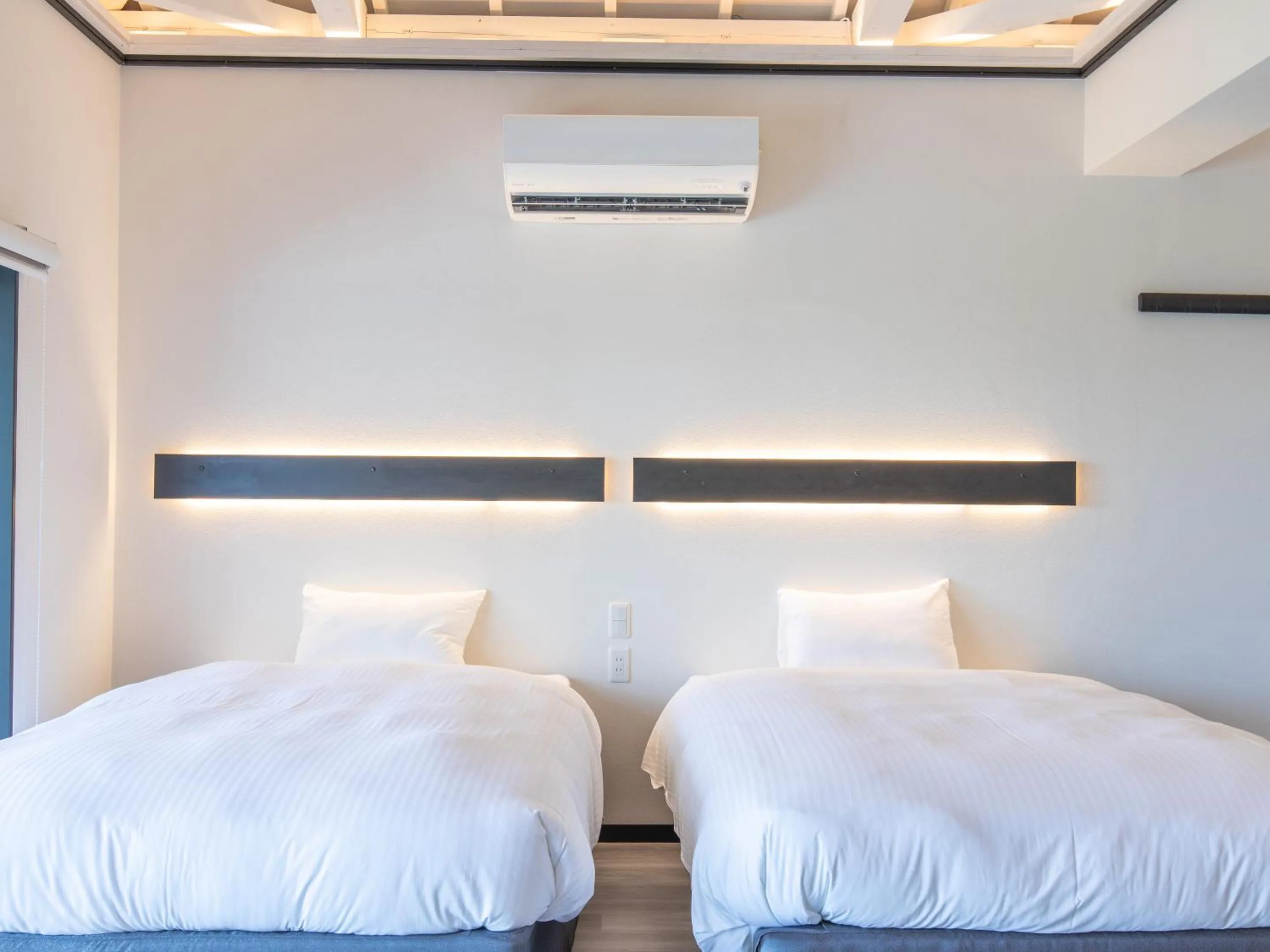 Bed in Nagahama Beach Resort Kanon