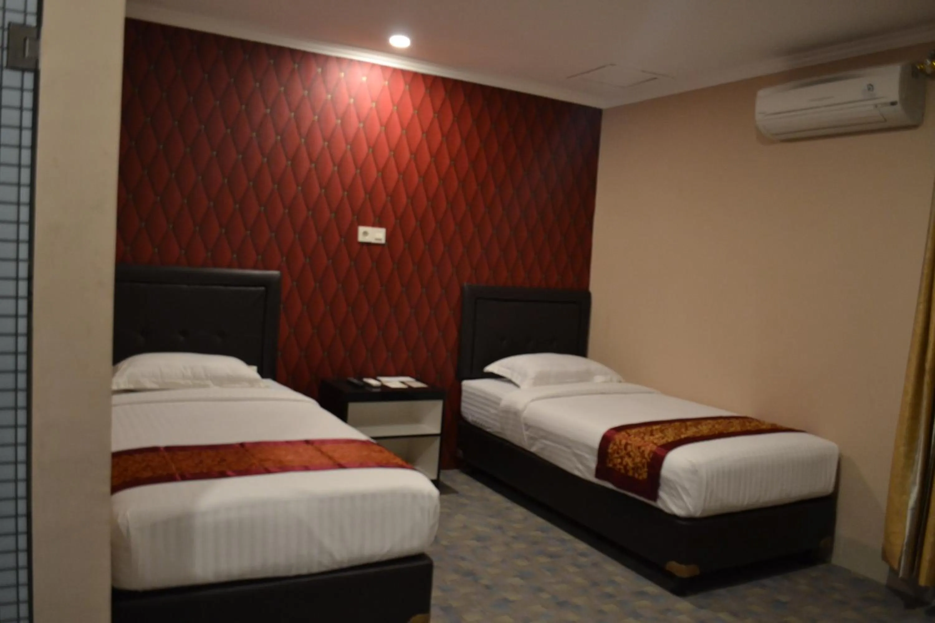 Bedroom, Bed in Puncak Budget Hotel