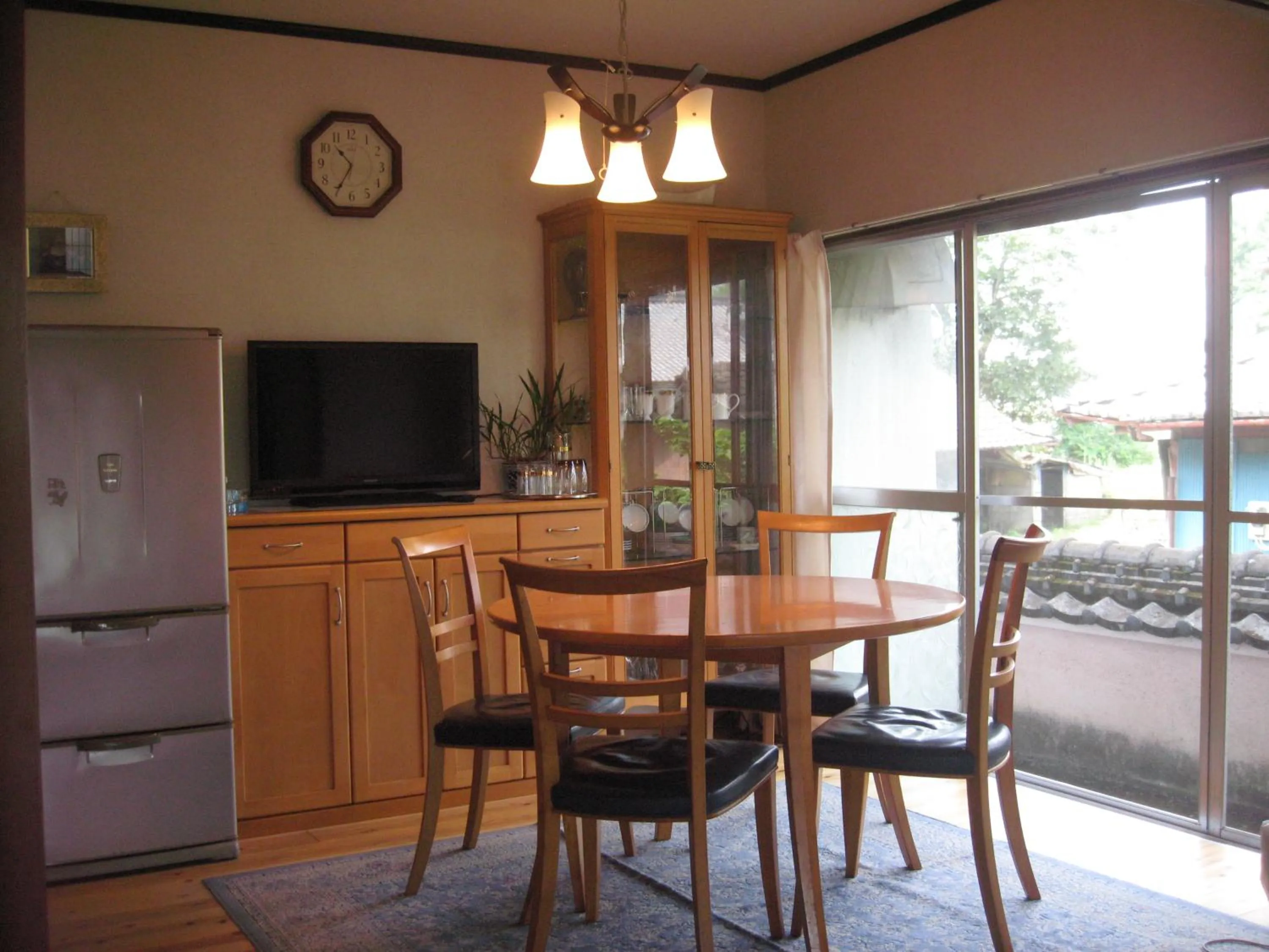 Communal lounge/ TV room in Guesthouse Fukiaesu