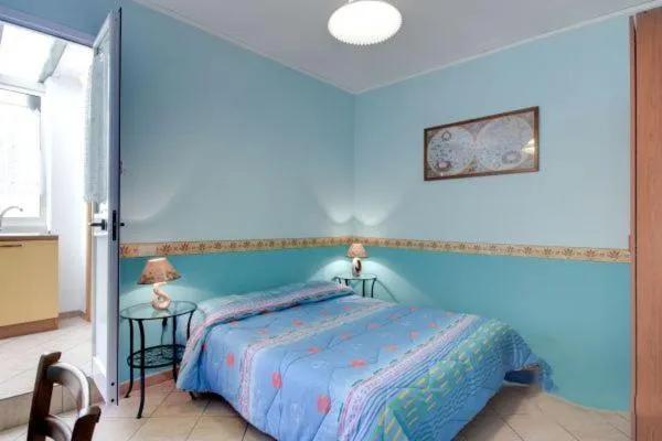 Photo of the whole room, Bed in La Dolce Vita Colosseum