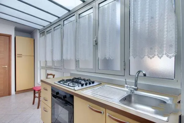 Kitchen or kitchenette in La Dolce Vita Colosseum