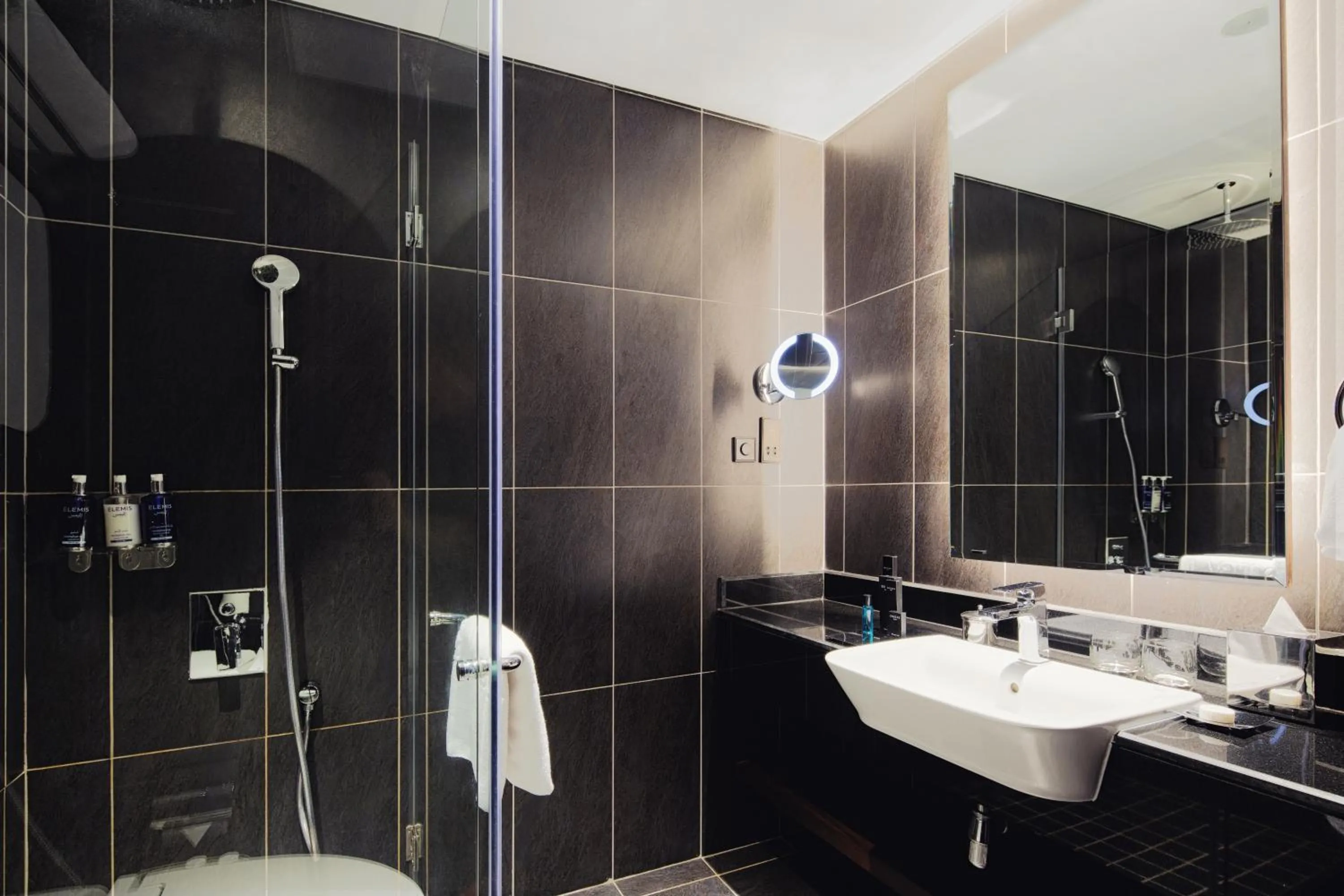 Bathroom in Dukes The Palm Dubai Hotel