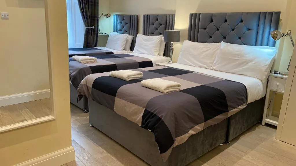 Photo of the whole room, Bed in Prime Inn