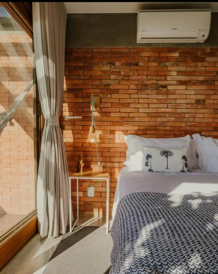 Bed in Villa Gardena Suites