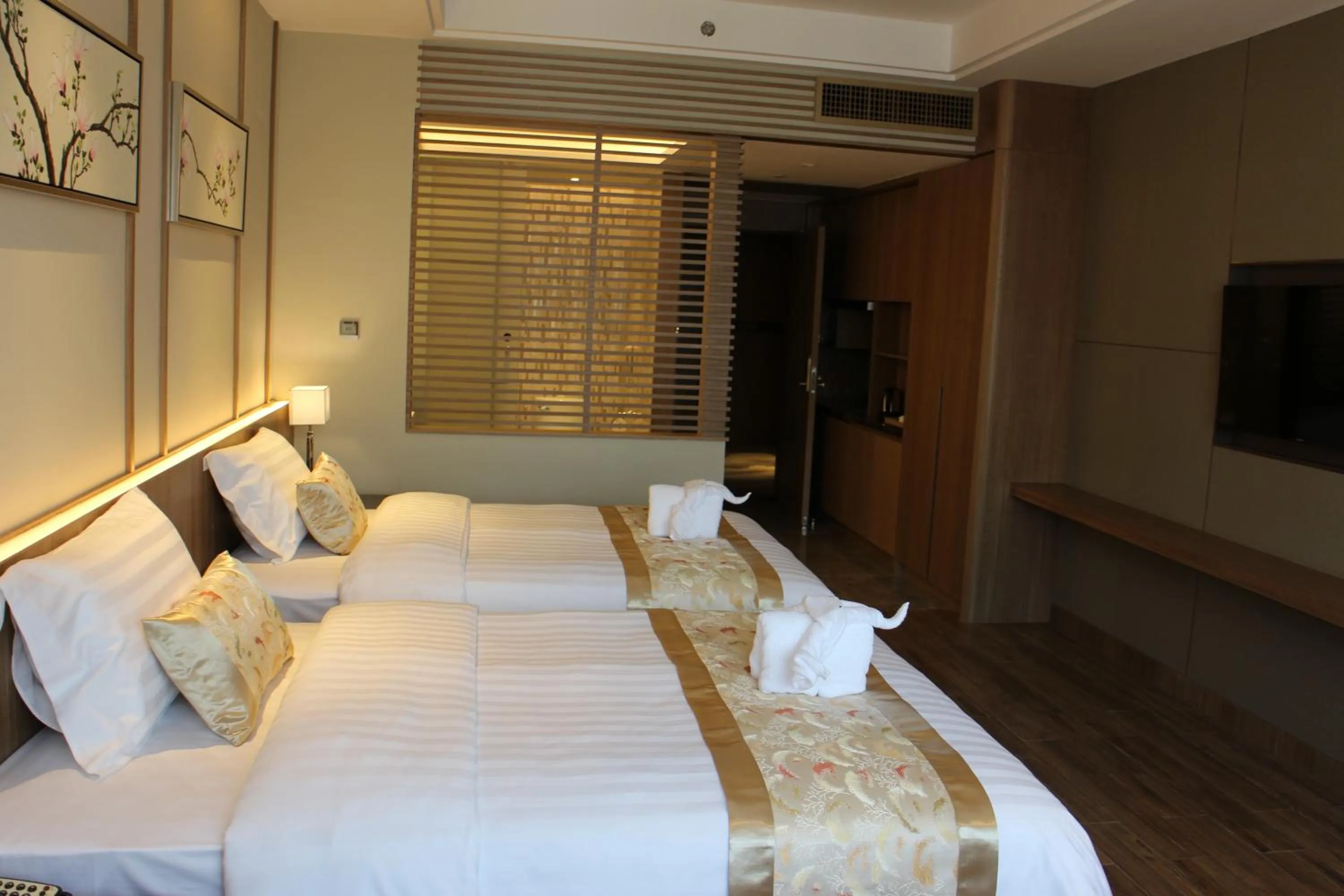 Bed in 南国会1站酒店 广交会免费穿梭巴士