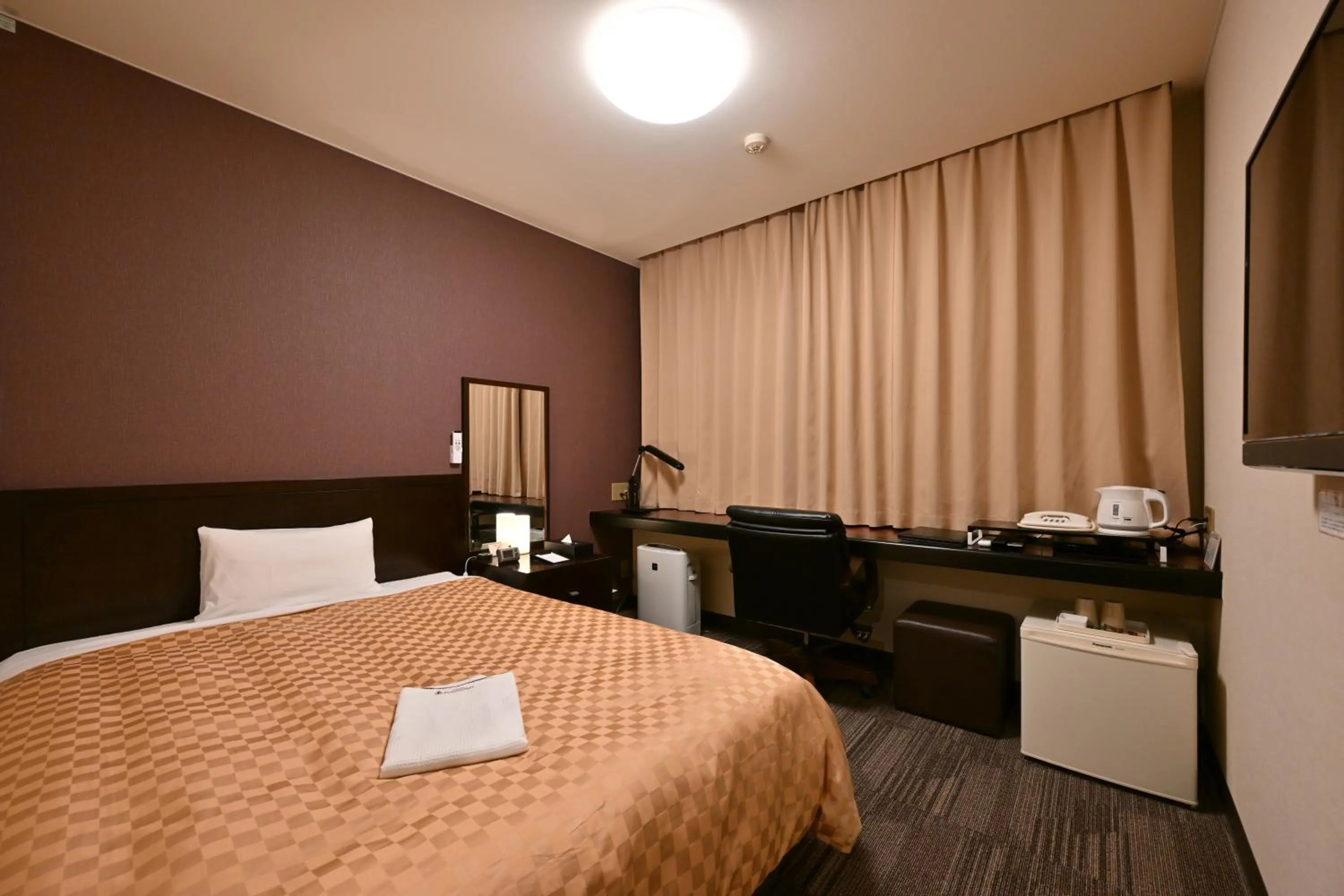 Bed in Hotel nanvan Yaizu