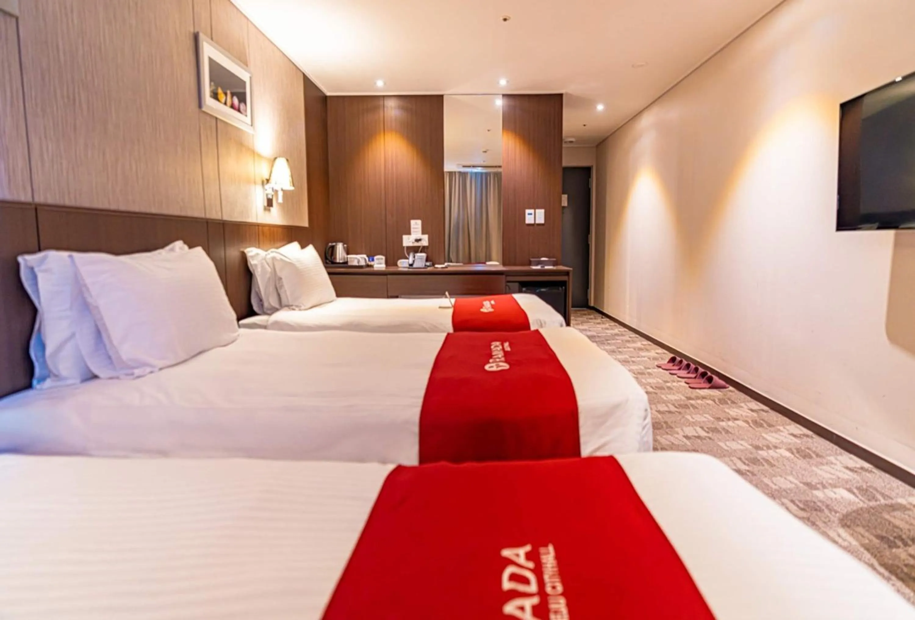 Photo of the whole room, Bed in Ramada by Wyndham Jeju City Hall