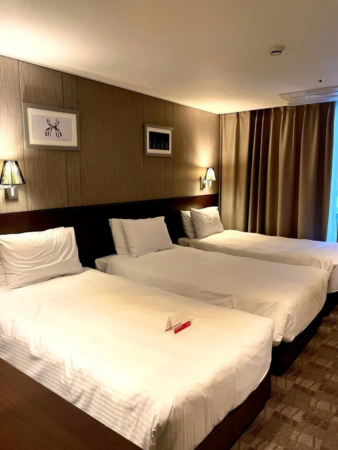 Bed in Ramada by Wyndham Jeju City Hall