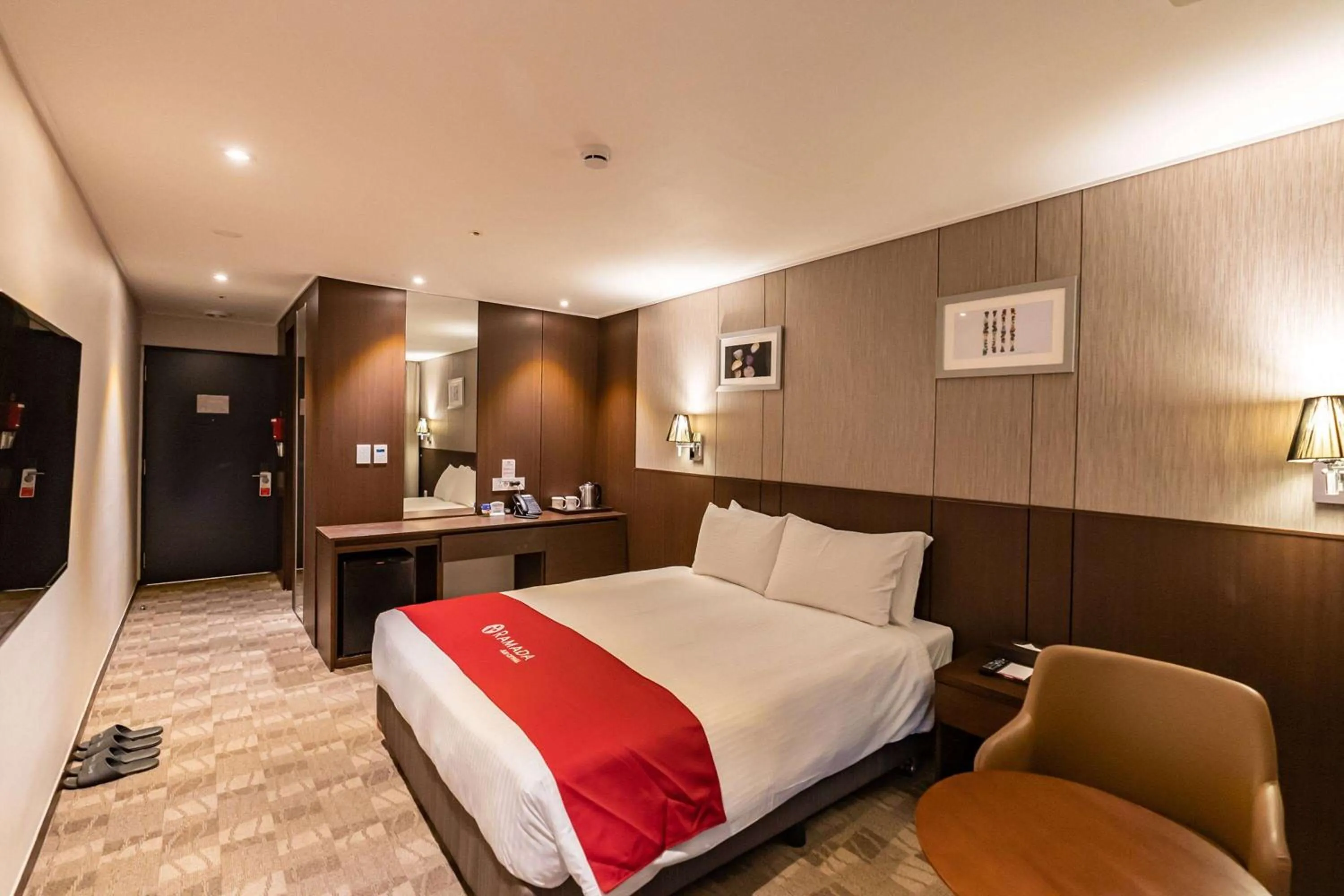 Photo of the whole room, Bed in Ramada by Wyndham Jeju City Hall