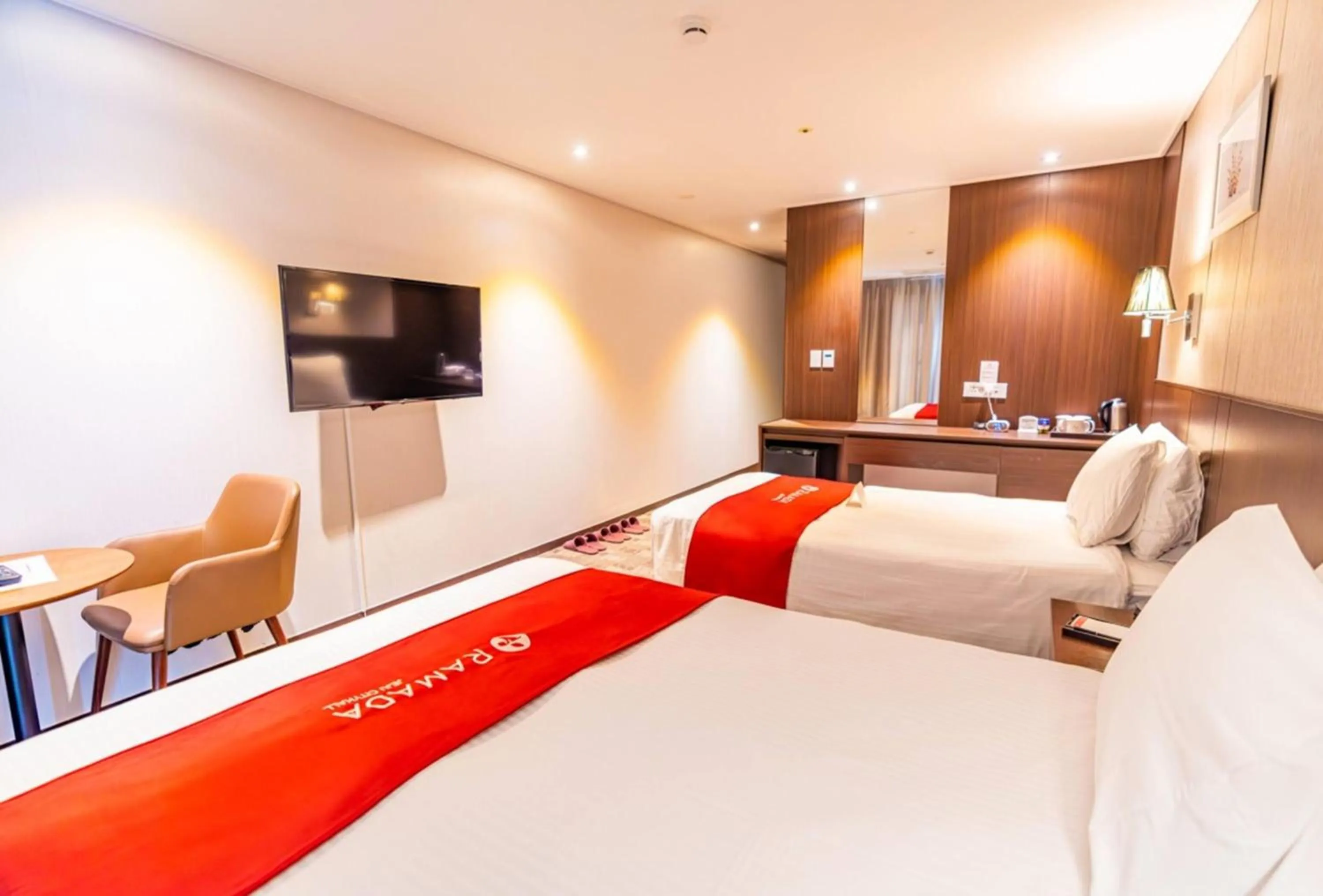 Photo of the whole room, Bed in Ramada by Wyndham Jeju City Hall