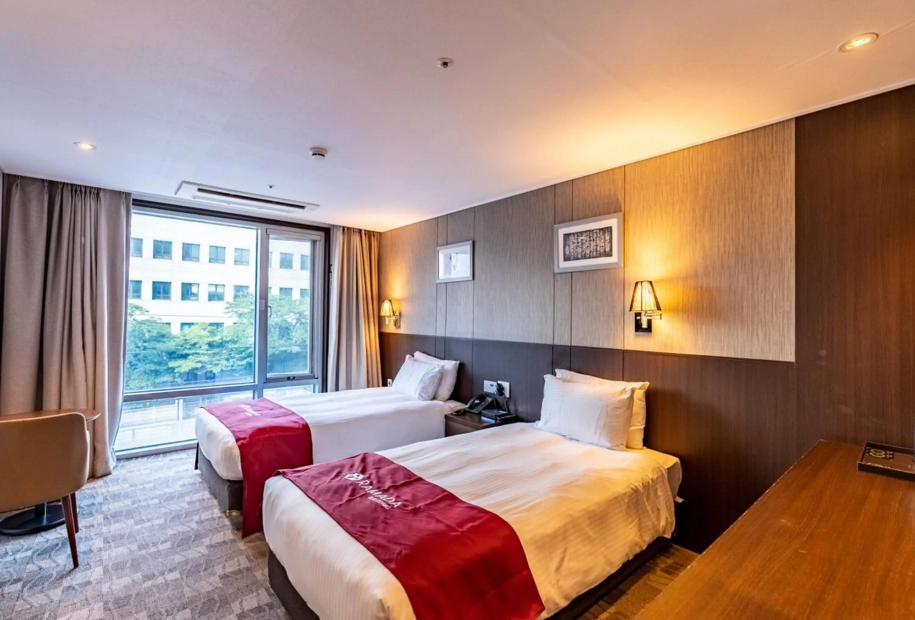 Photo of the whole room, Bed in Ramada by Wyndham Jeju City Hall